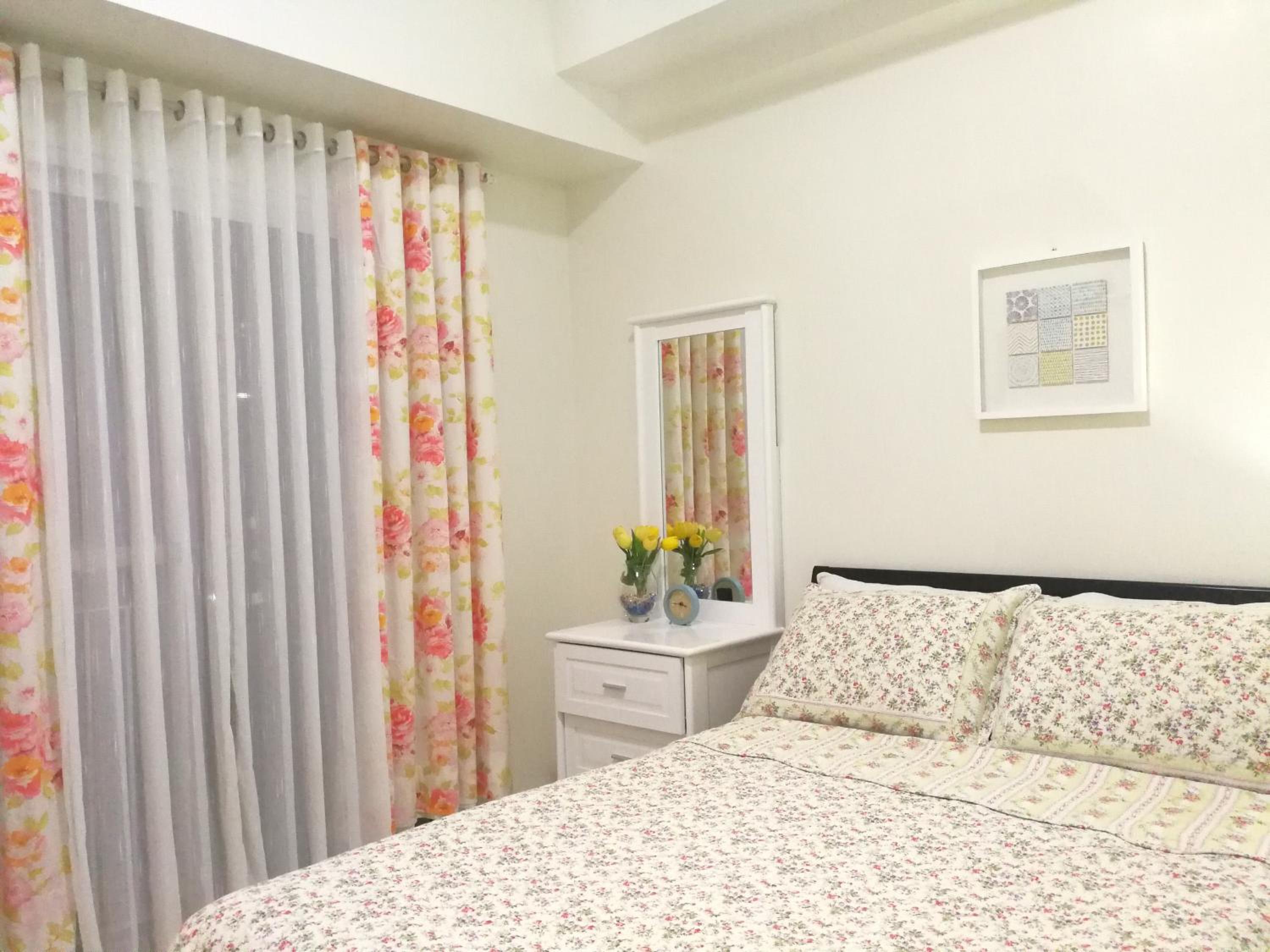 Cozy Condo at Wind Residences