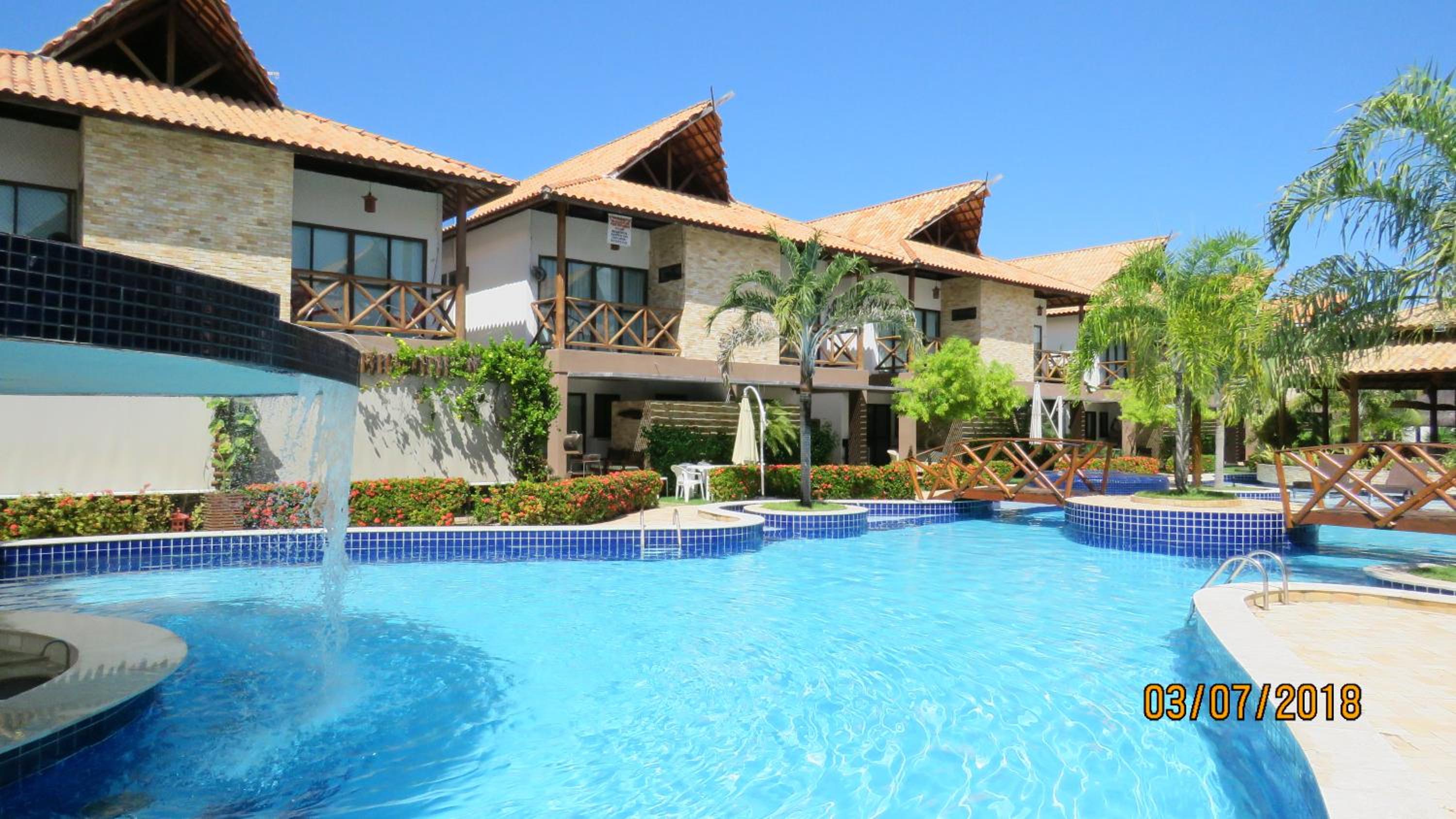 Bangalô com área de lazer estilo resort