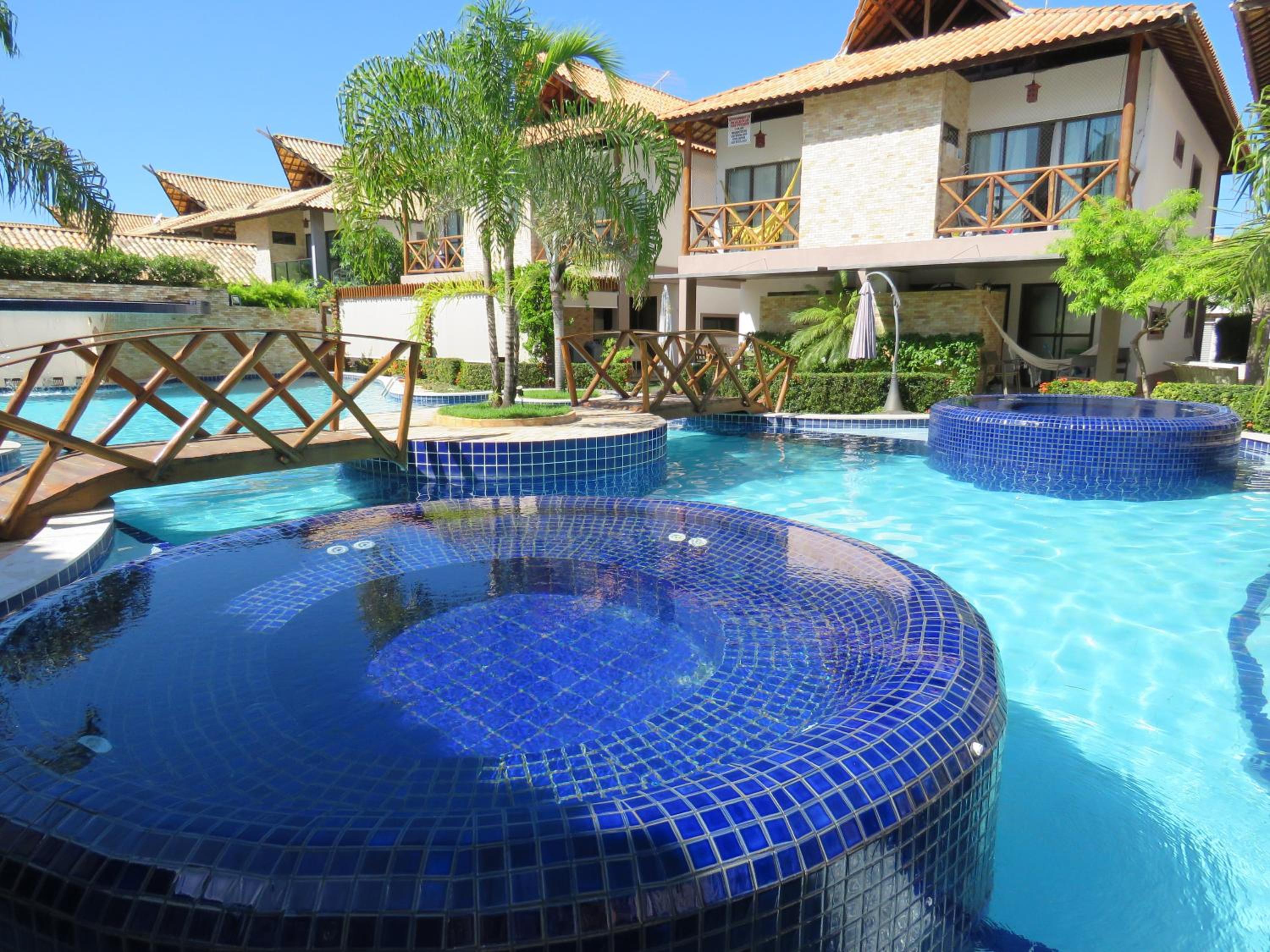 Bangalô com área de lazer estilo resort