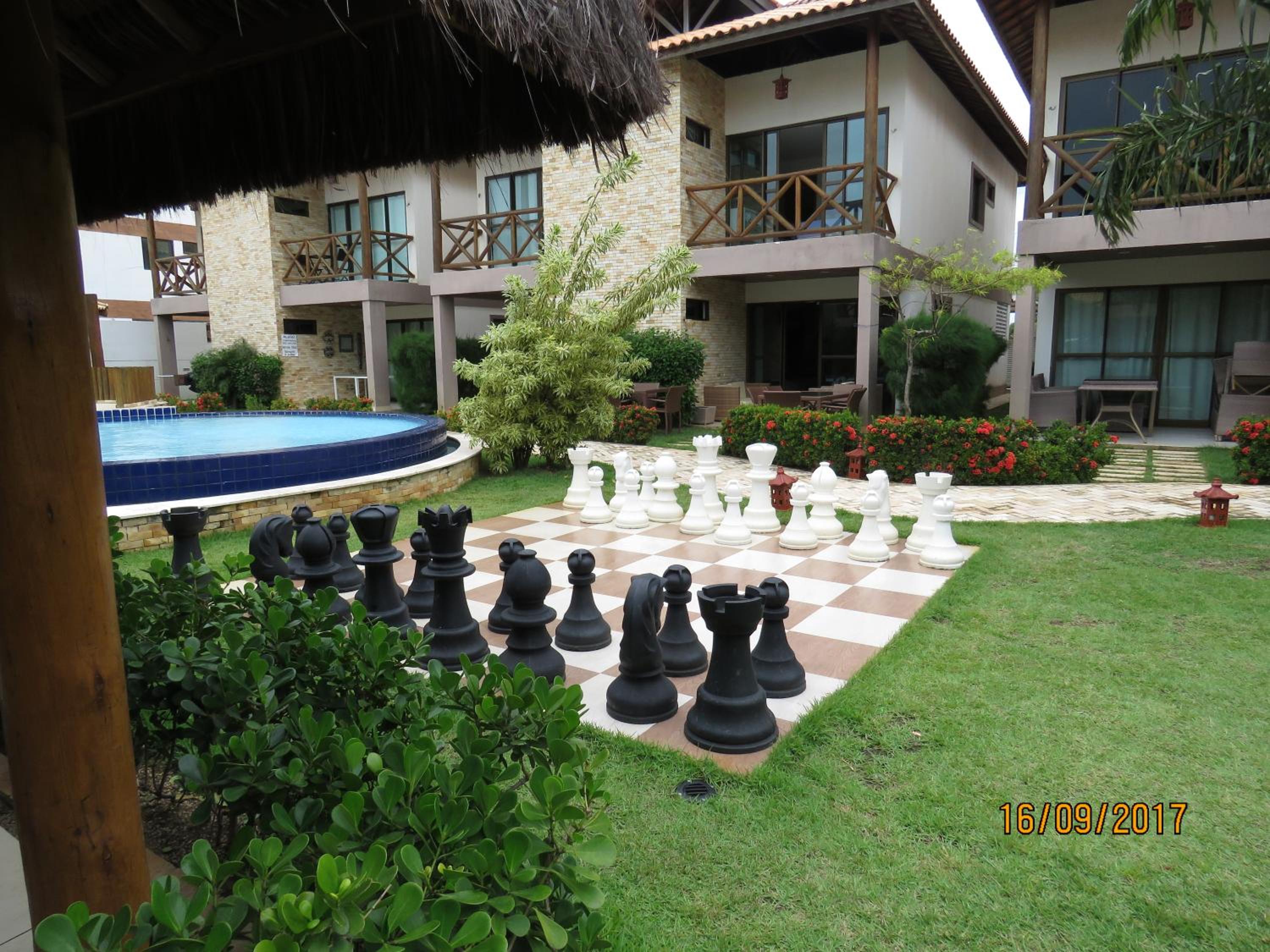 Bangalô com área de lazer estilo resort