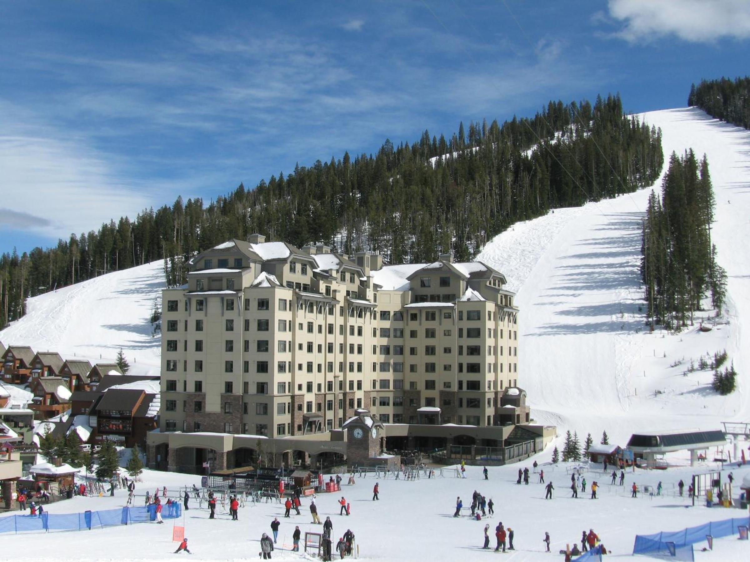 View of Big Sky Resort Lodging at The Summit Hotel at the base of the slopes