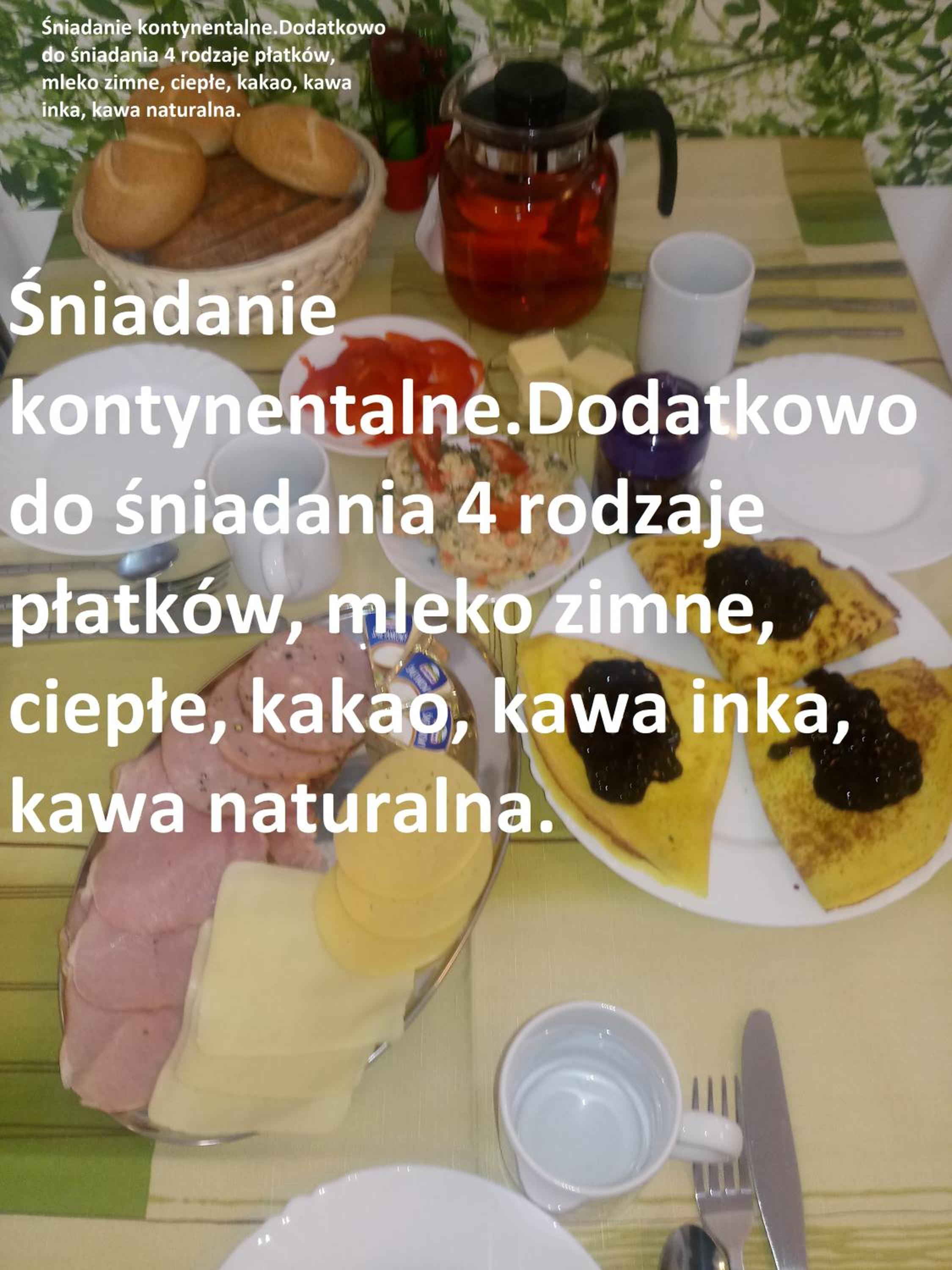 DOMINO - pokoje i apartamenty view 3