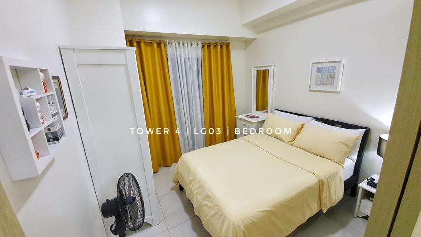 Cozy Condo at Wind Residences view 2