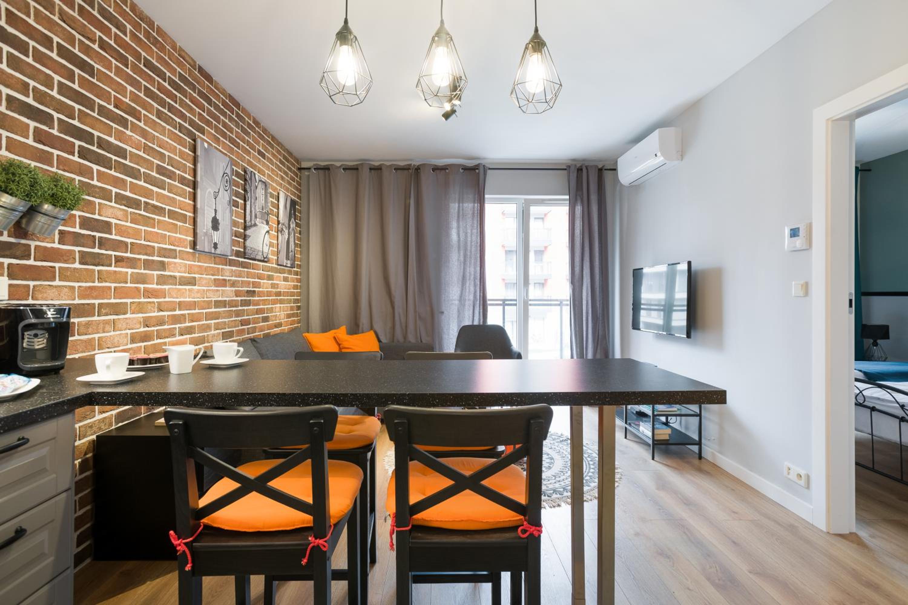 Orange, modern apartment in the city centre