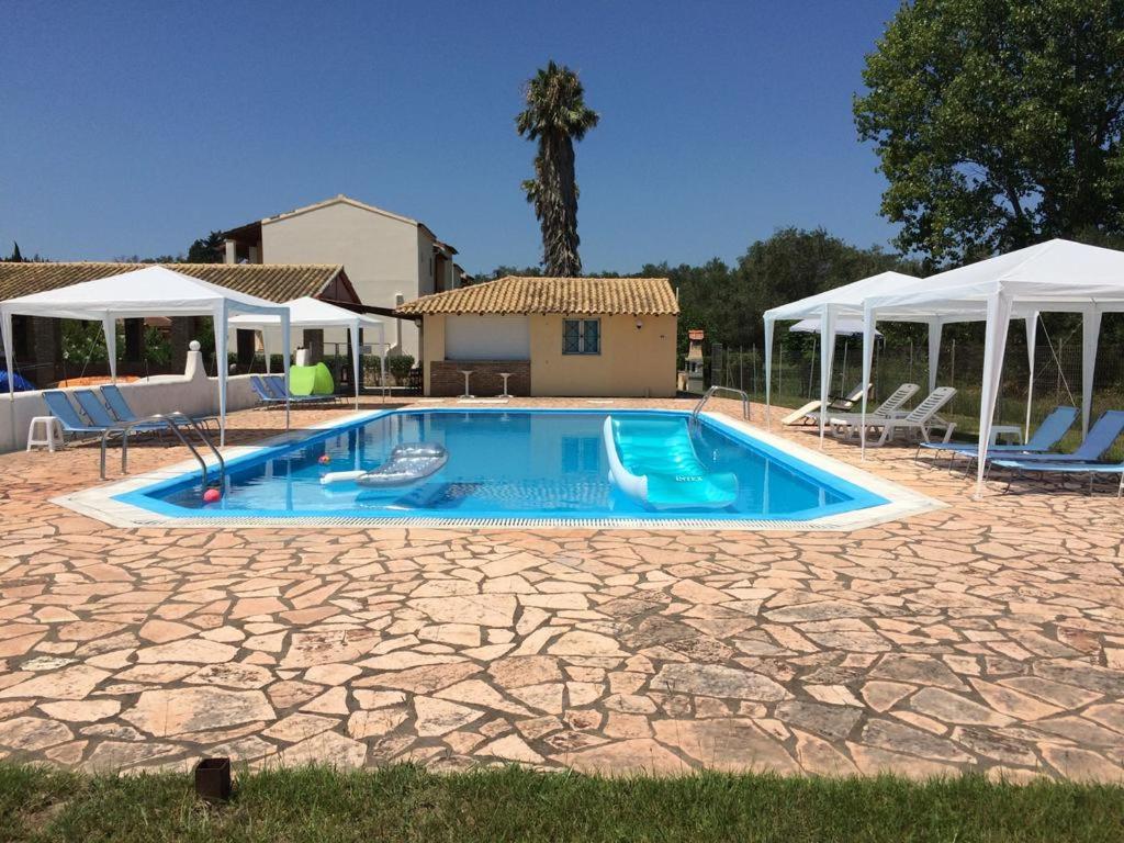 NEFELI House