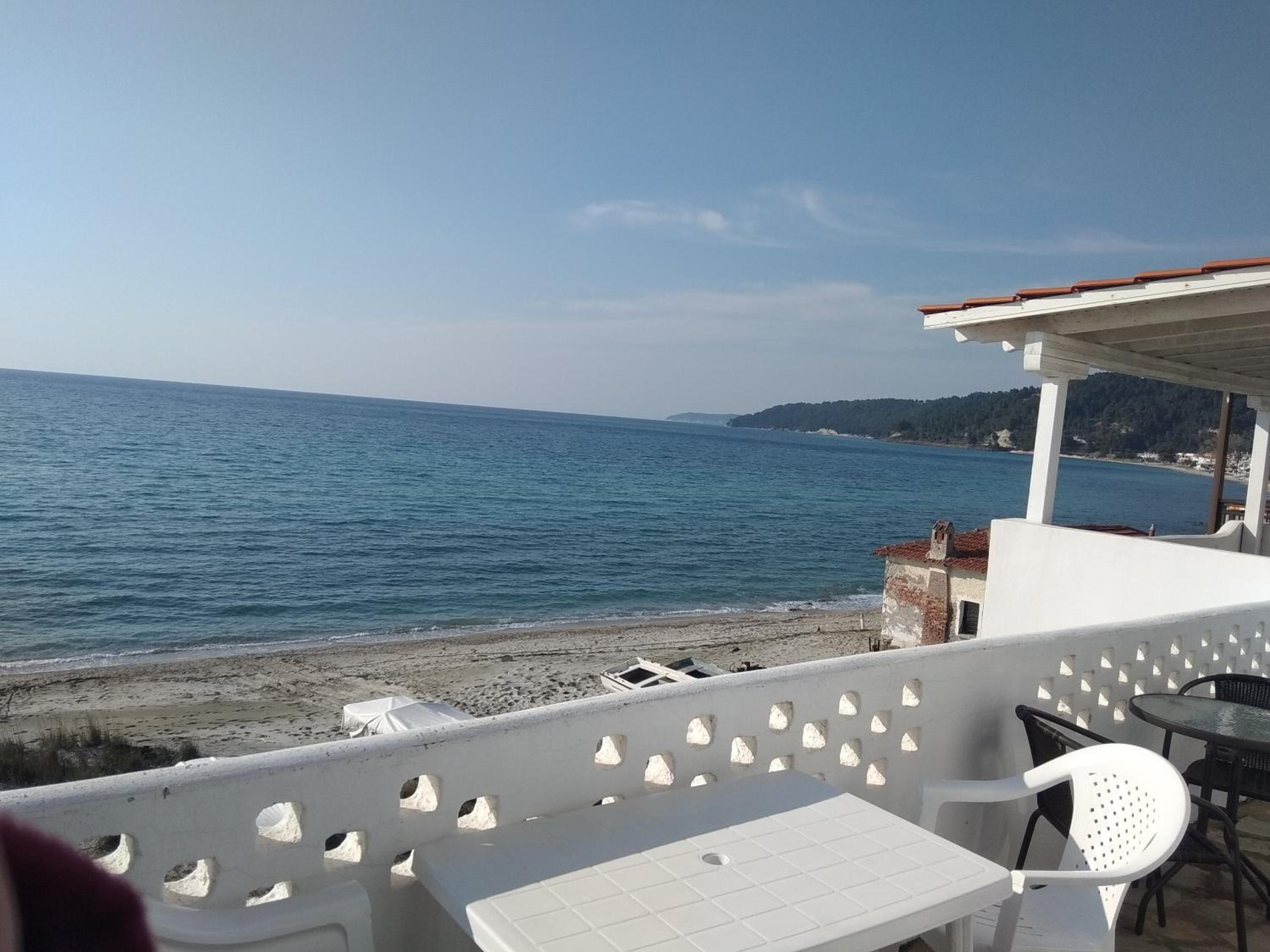 Golden sunset beach house view 2