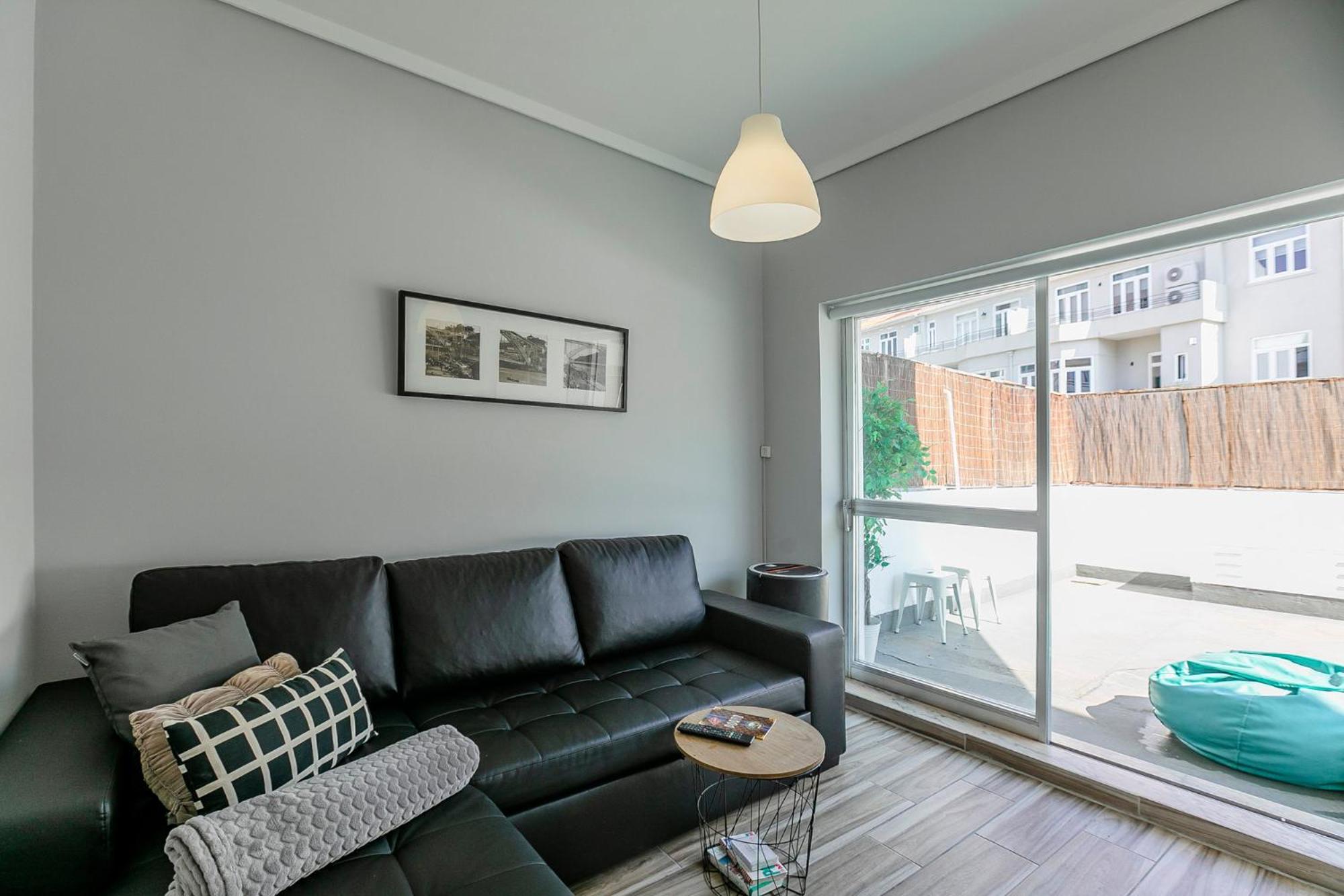 Porto Stanza - 1BR Flat Downtown with Patio by LovelyStay