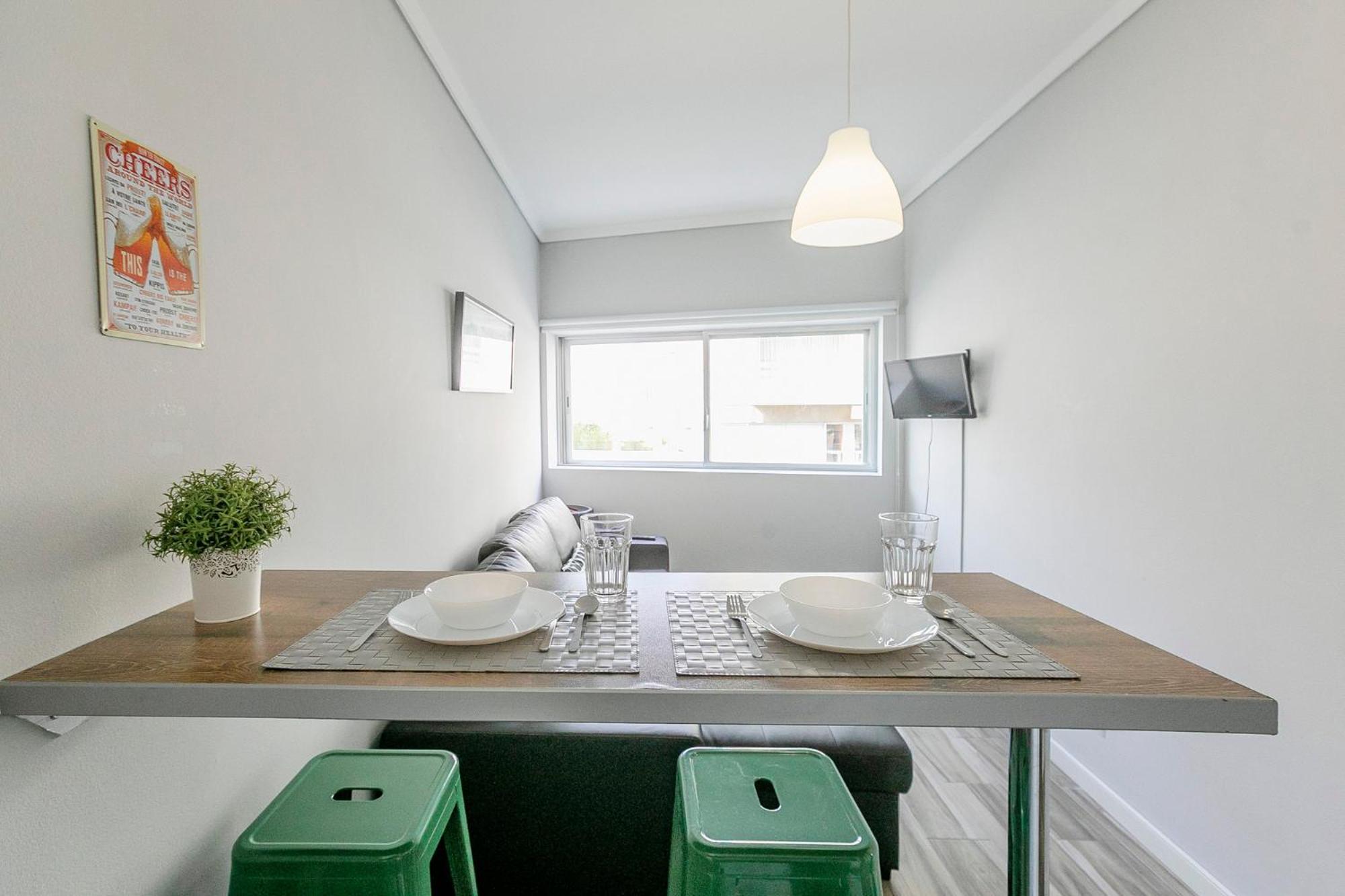 Porto Stanza - 1BR Flat Downtown with Patio by LovelyStay
