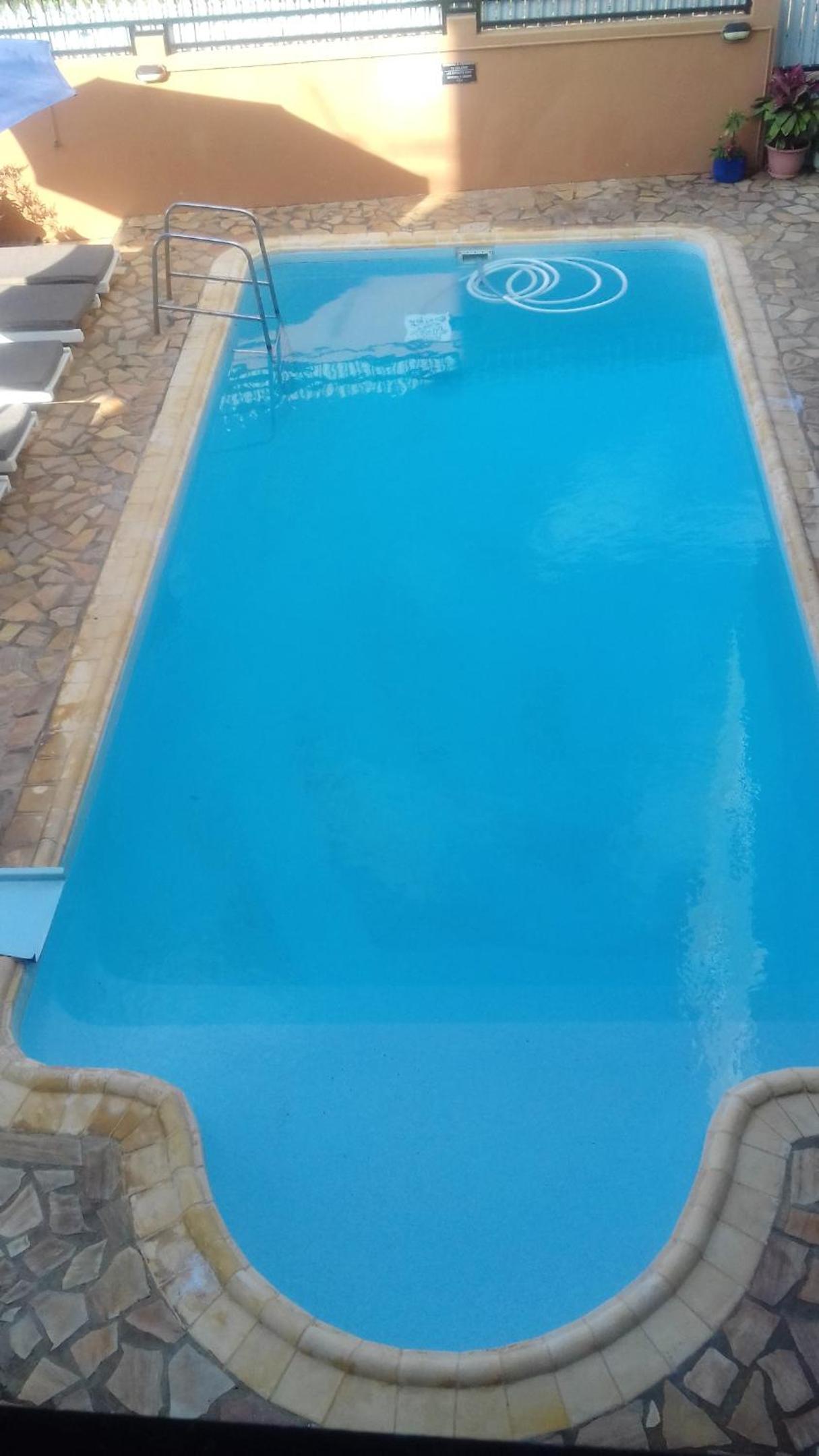 Studio at Pointe aux piments 200 m away from the beach with shared pool balcony and wifi
