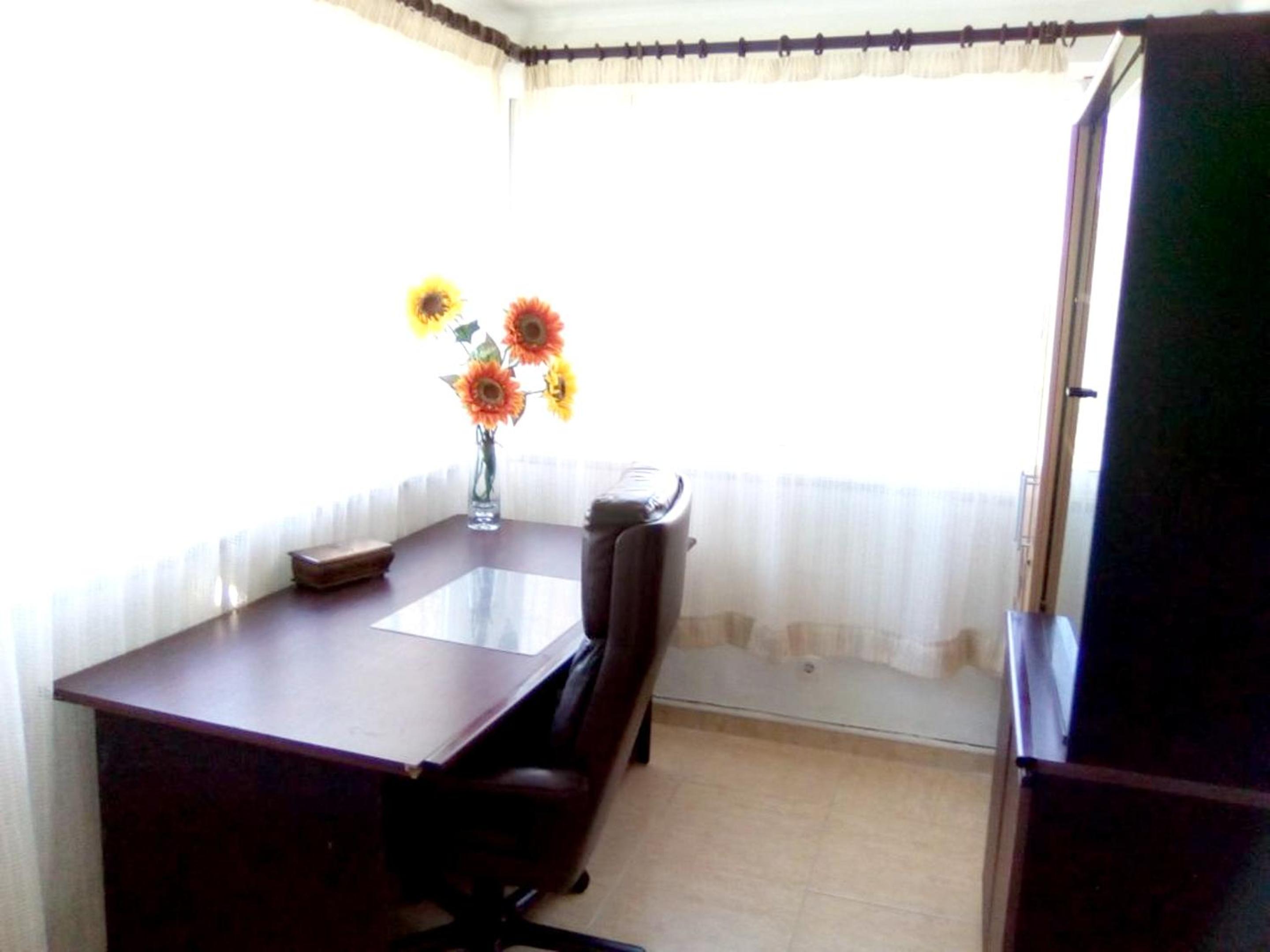 4 bedrooms house with shared pool furnished garden and wifi at Corroios 4 km away from the beach
