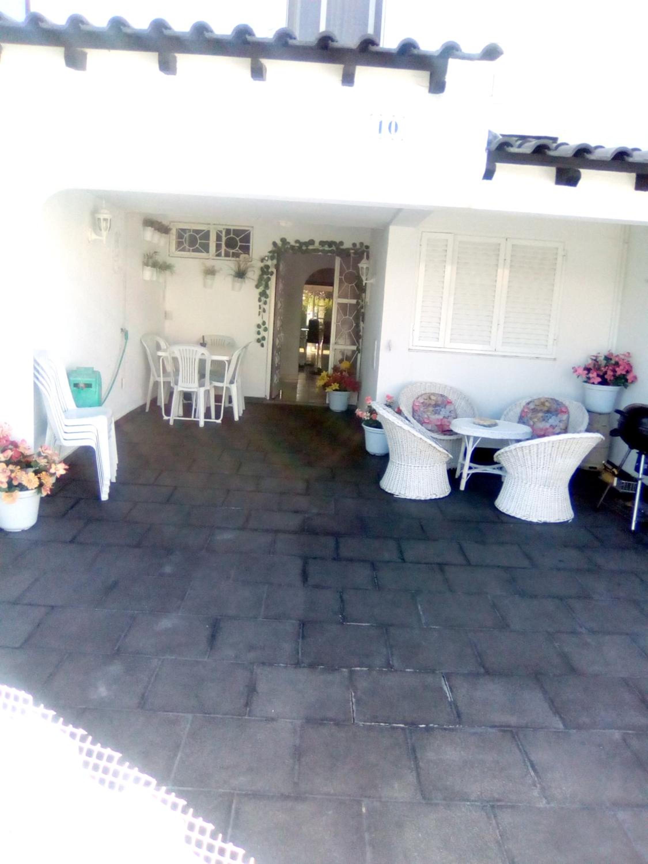 4 bedrooms house with shared pool furnished garden and wifi at Corroios 4 km away from the beach