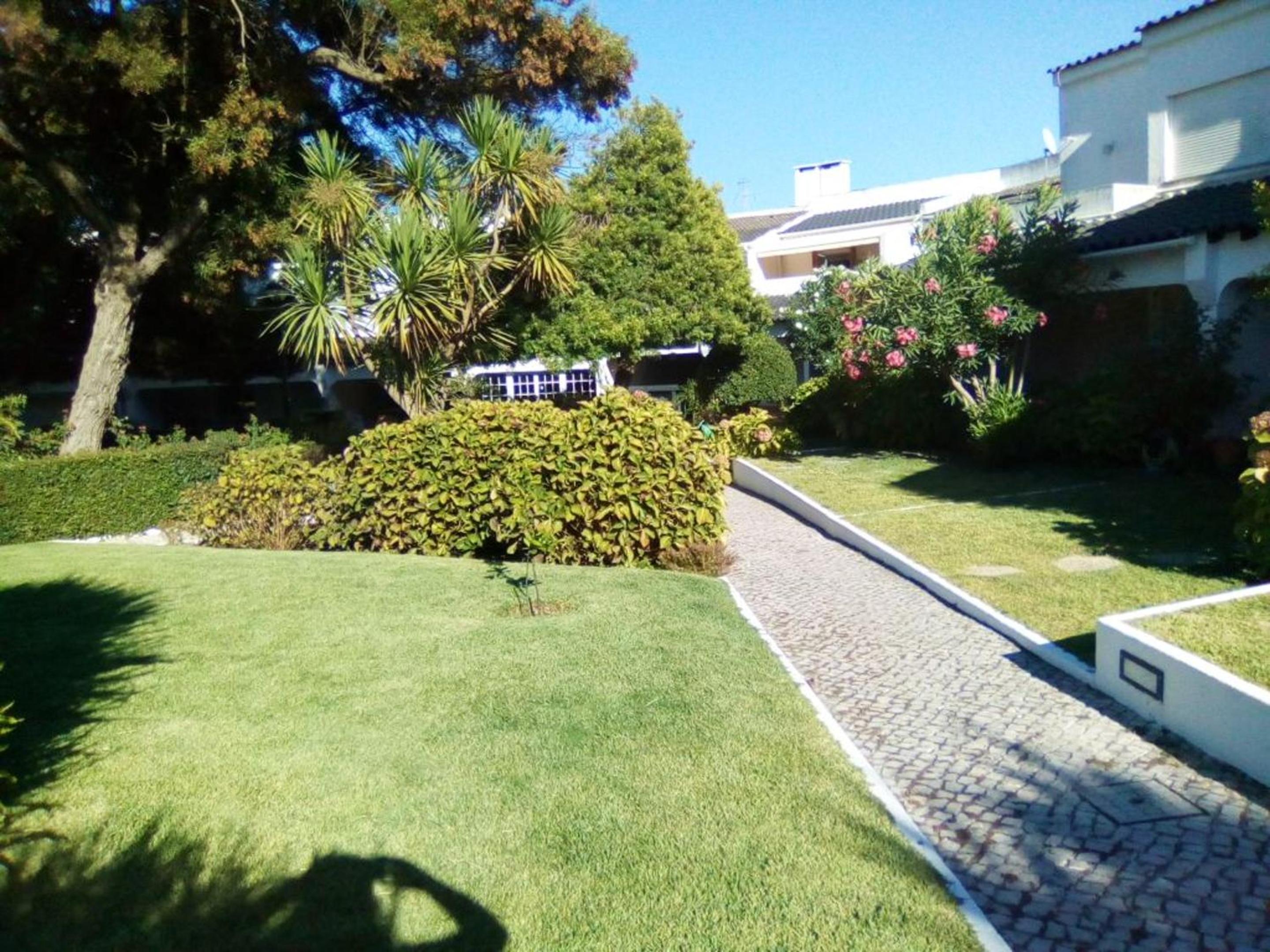 4 bedrooms house with shared pool furnished garden and wifi at Corroios 4 km away from the beach