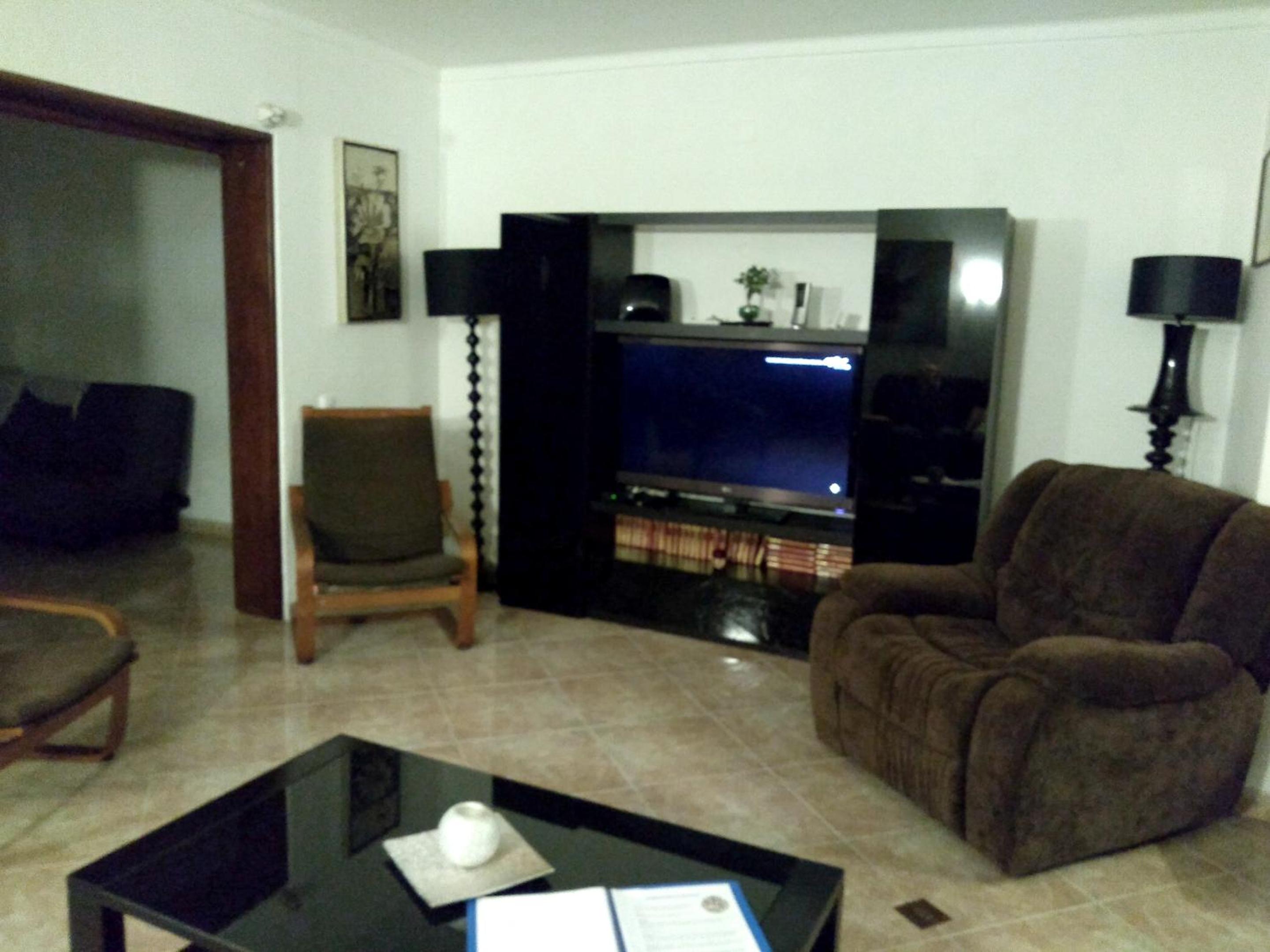 4 bedrooms house with shared pool furnished garden and wifi at Corroios 4 km away from the beach