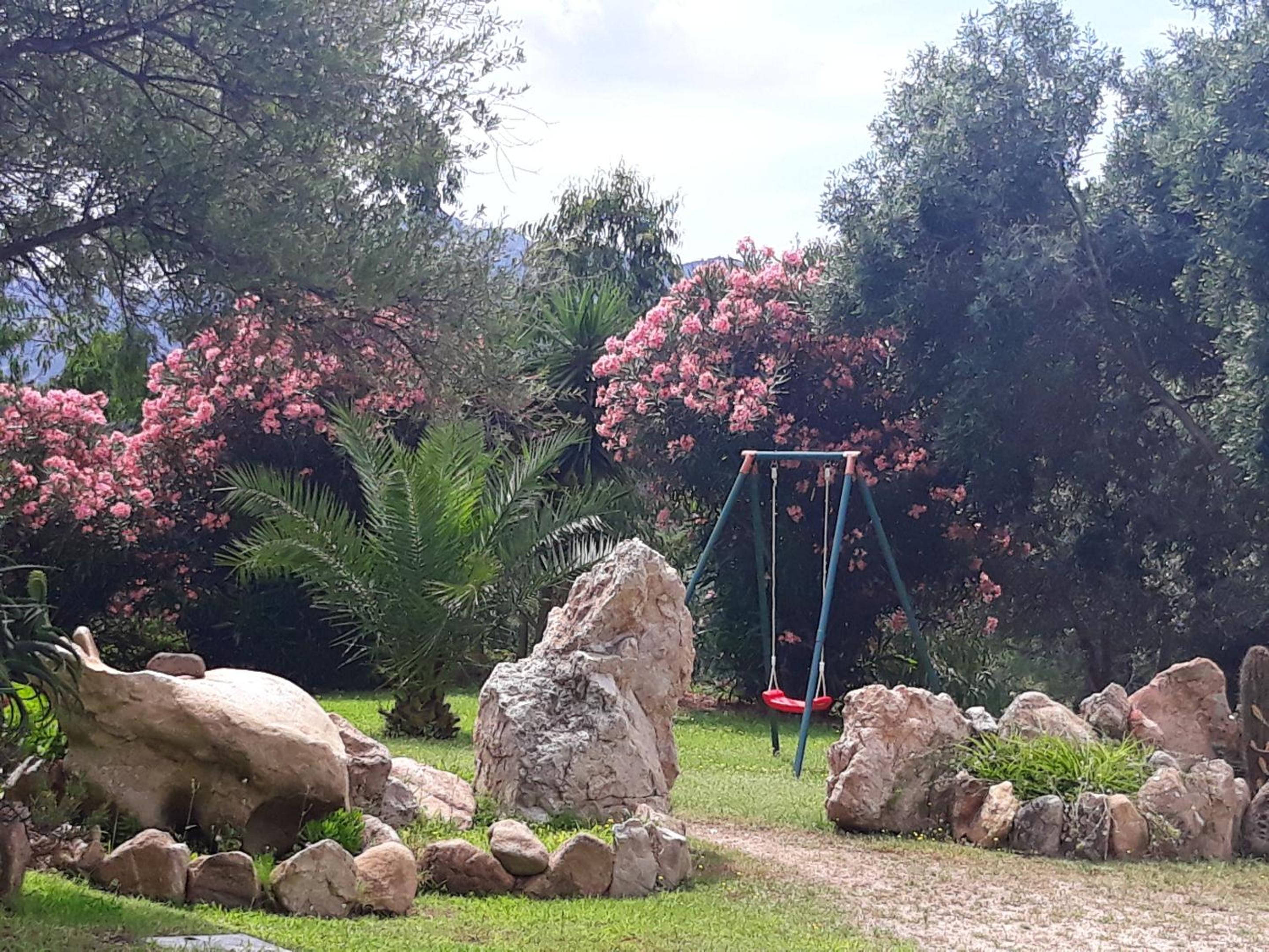 2 bedrooms appartement with sea view enclosed garden and wifi at Olbia 6 km away from the beach