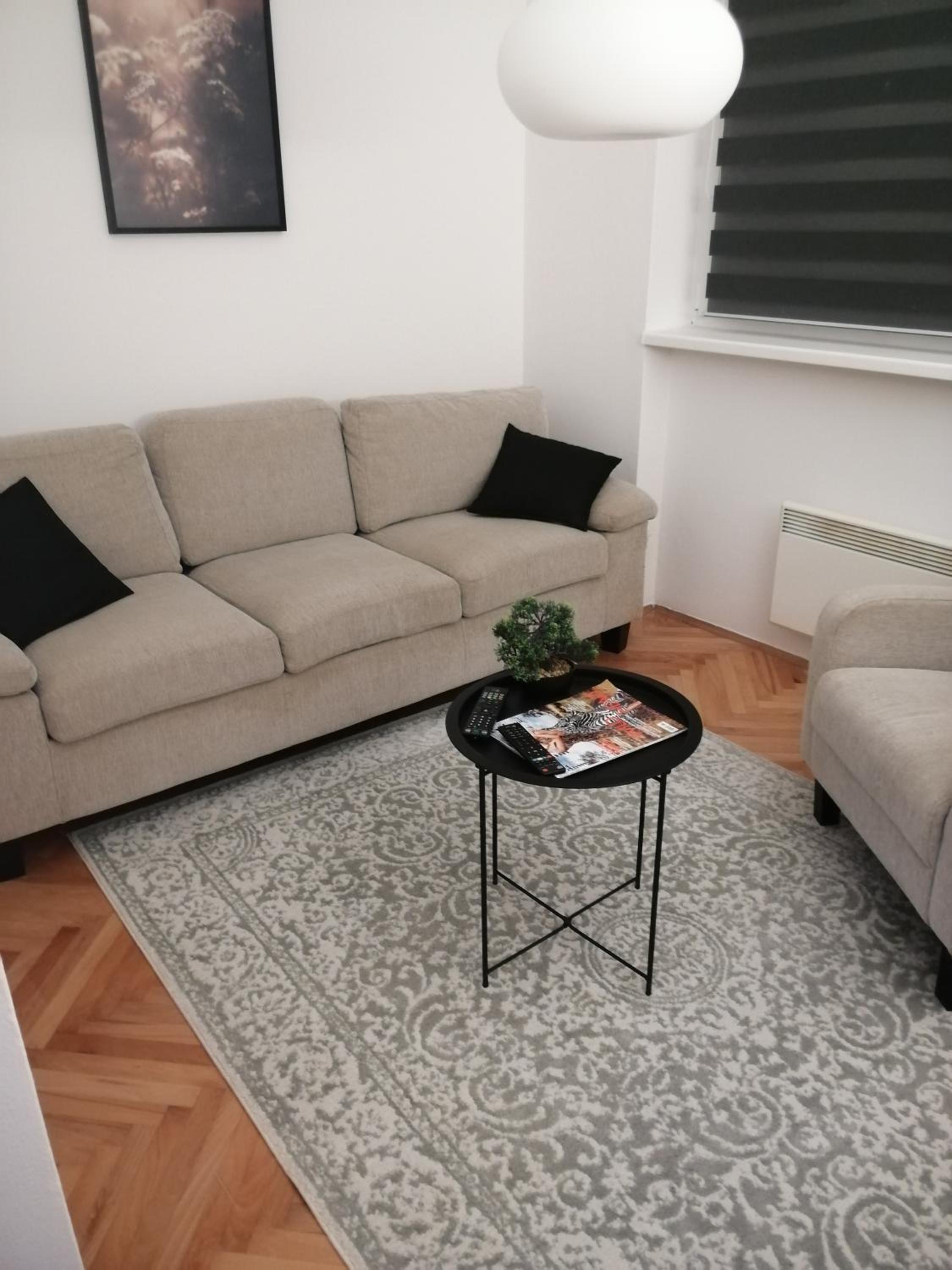 Small (34m2) modern apartment with parking place