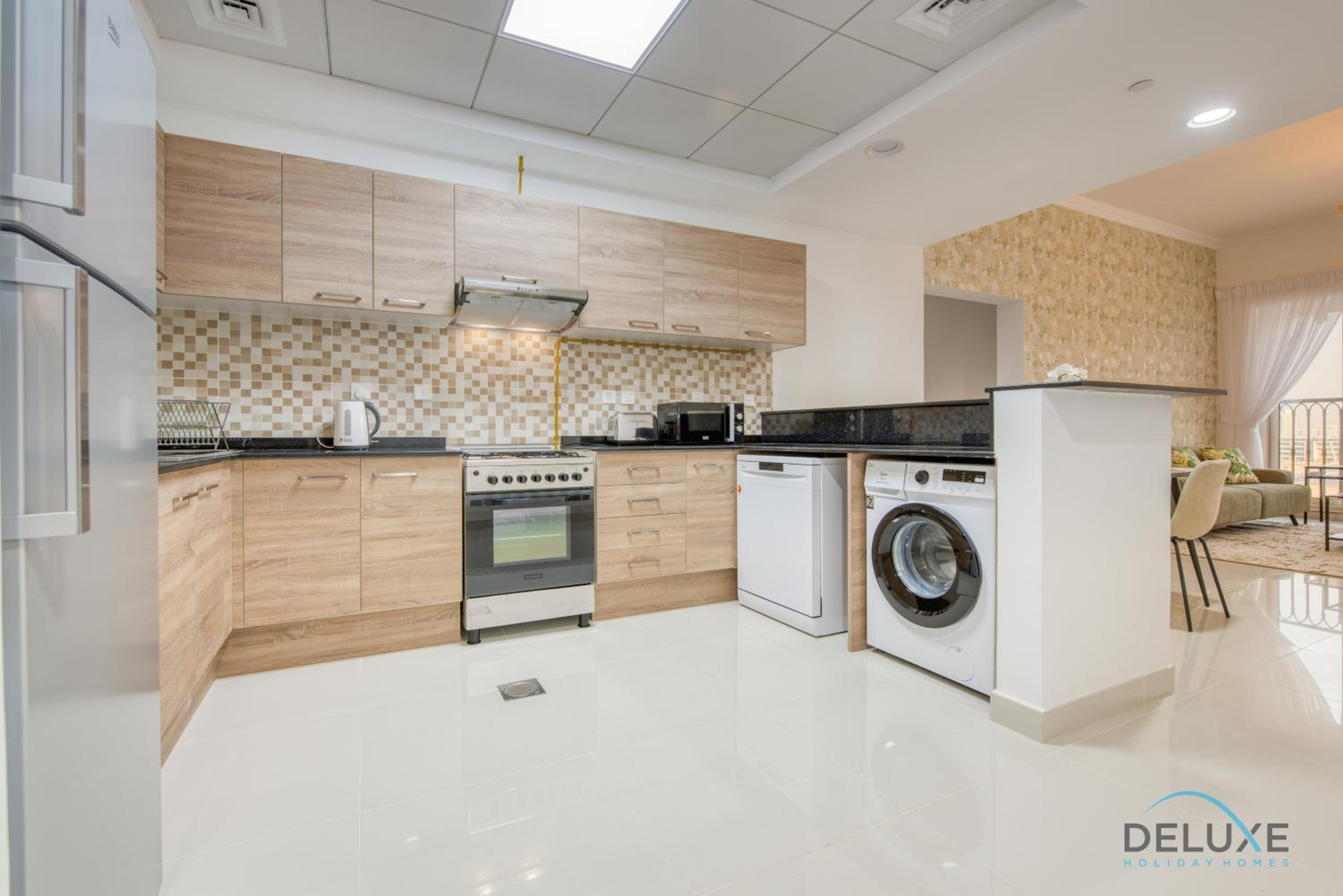 Sunny 1BR at Canal Residences West Dubai Sports City by Deluxe Holiday Homes