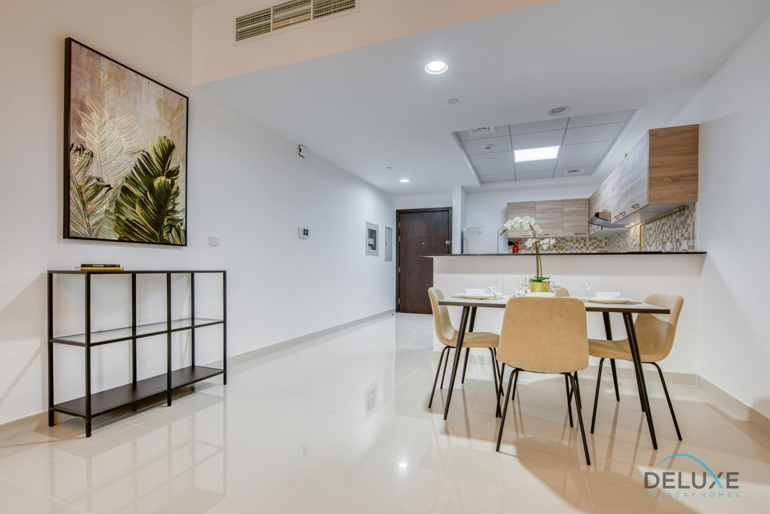 Sunny 1BR at Canal Residences West Dubai Sports City by Deluxe Holiday Homes