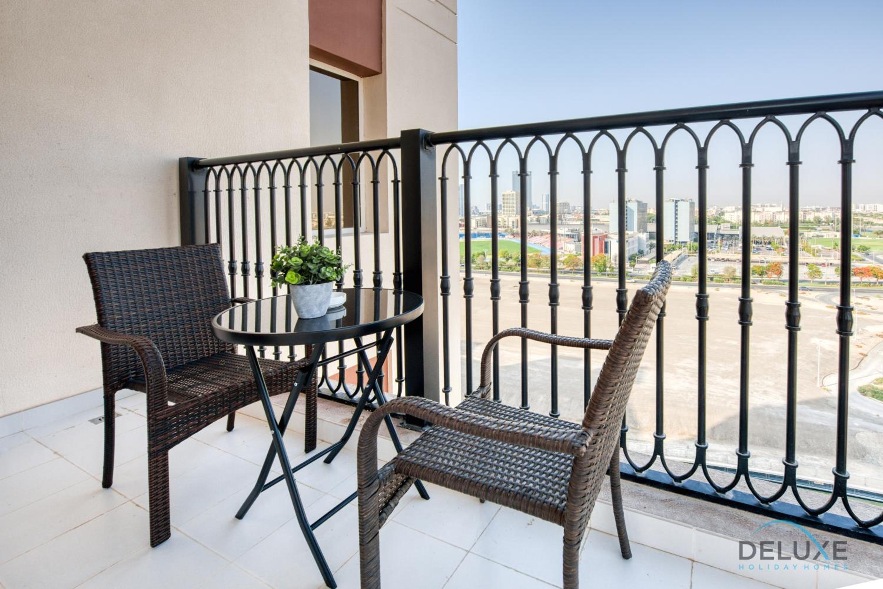 Sunny 1BR at Canal Residences West Dubai Sports City by Deluxe Holiday Homes