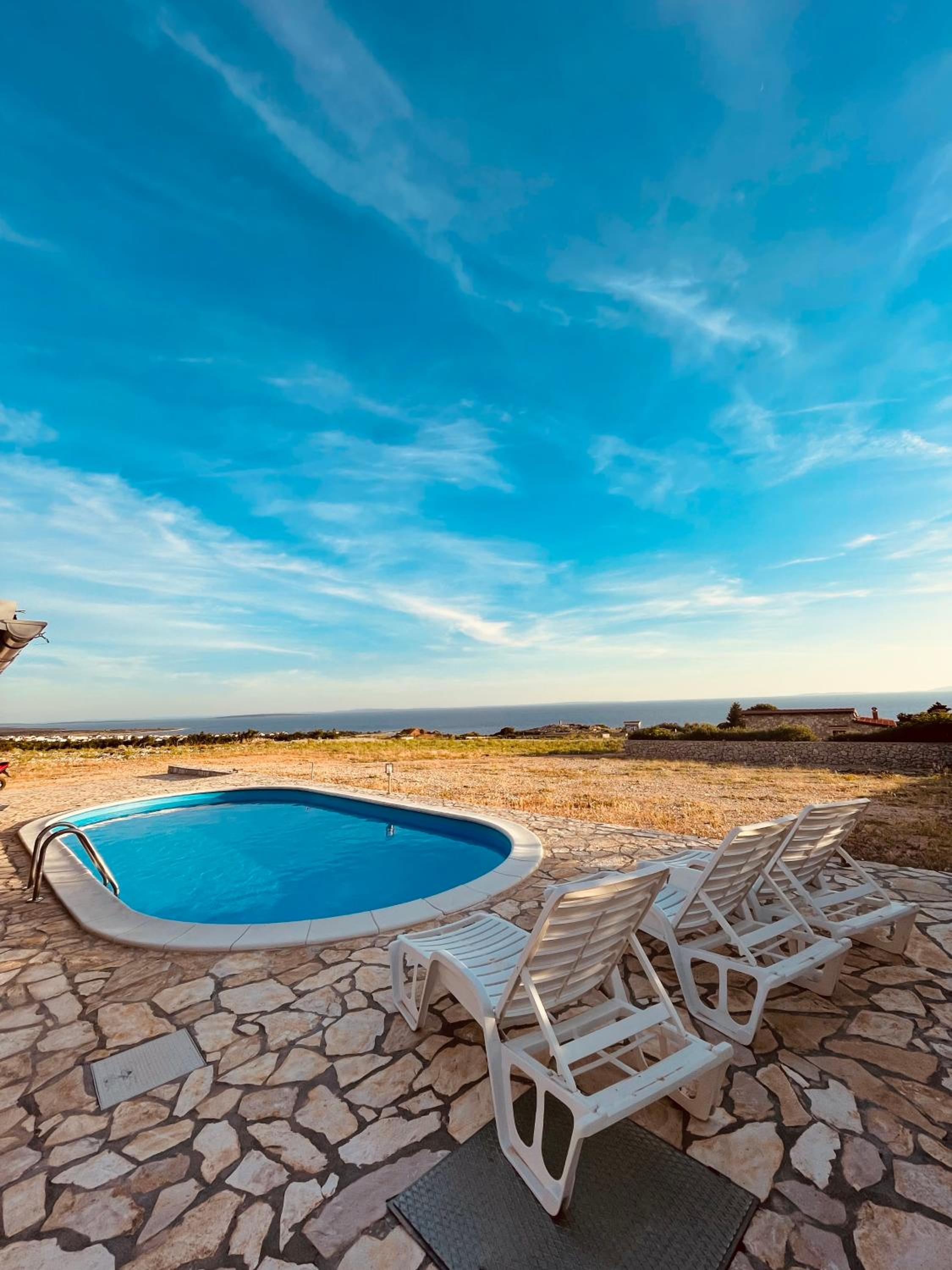 Beautiful secluded area near Novalja vacation house with pool and sea view Villa Lara