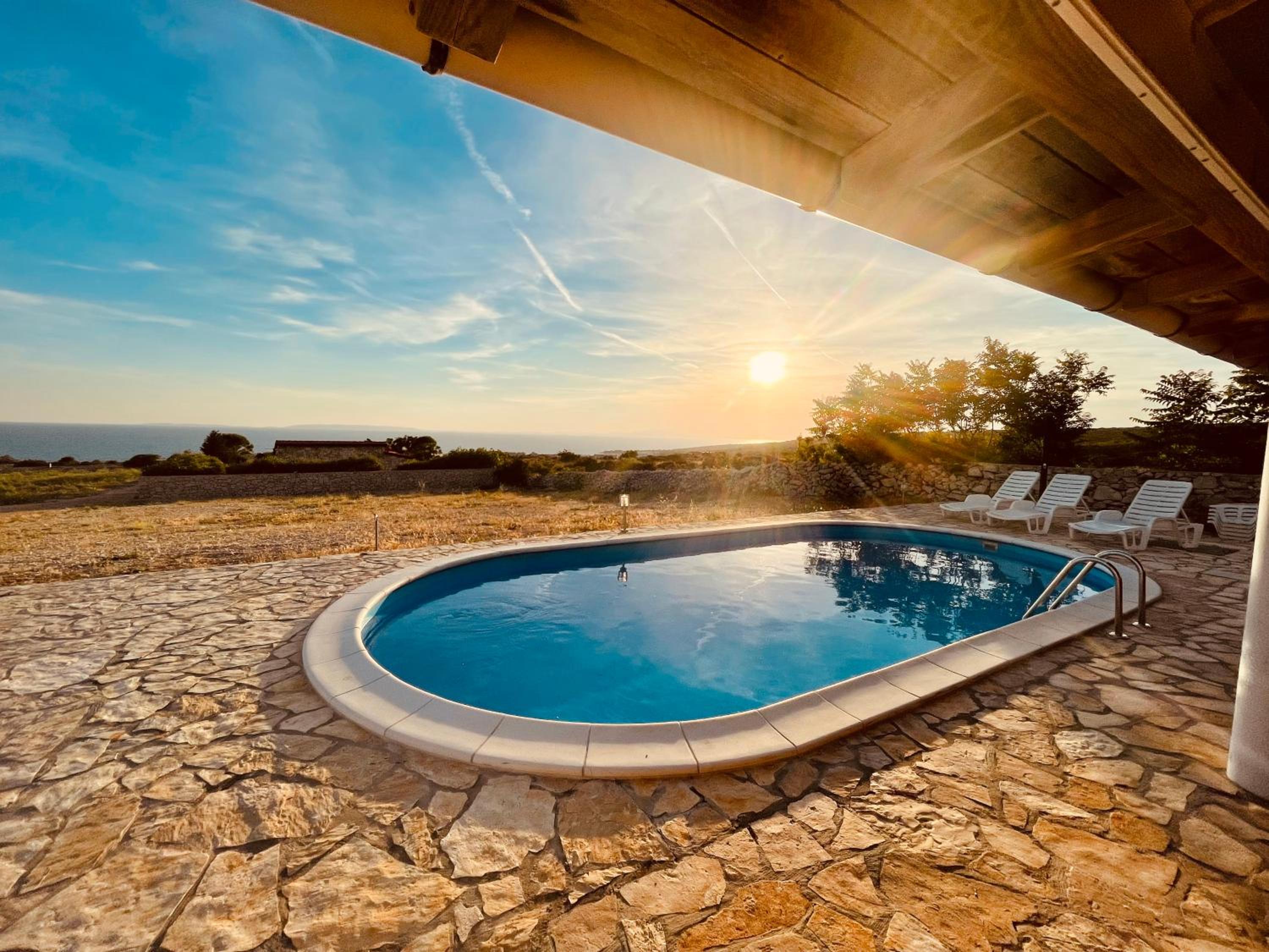 Beautiful secluded area near Novalja vacation house with pool and sea view Villa Lara