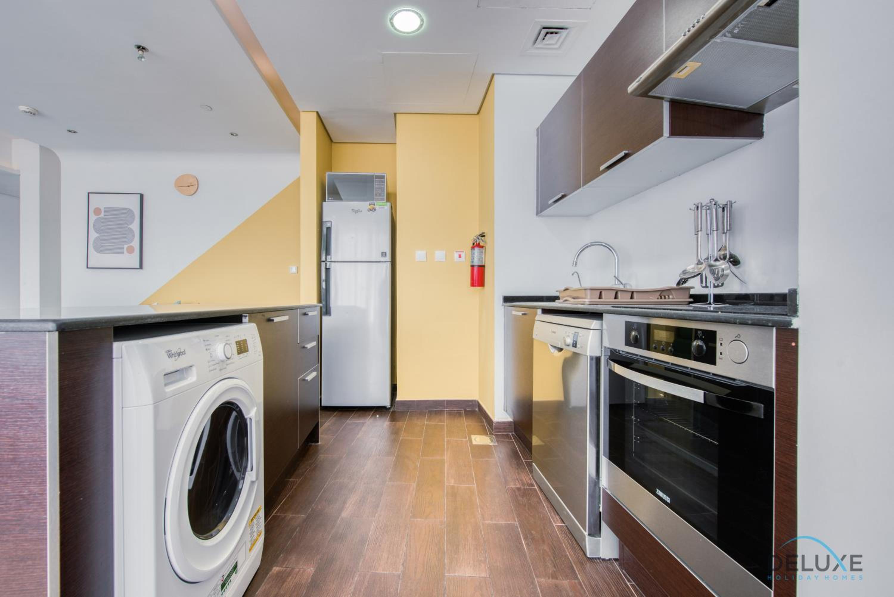 Homely 1BR at The Matrix Dubai Sports City by Deluxe Holiday Homes