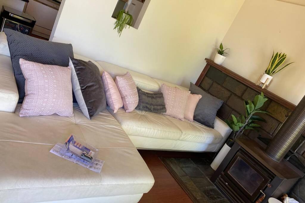 Relax in the spa with views opposite Lake Eildon