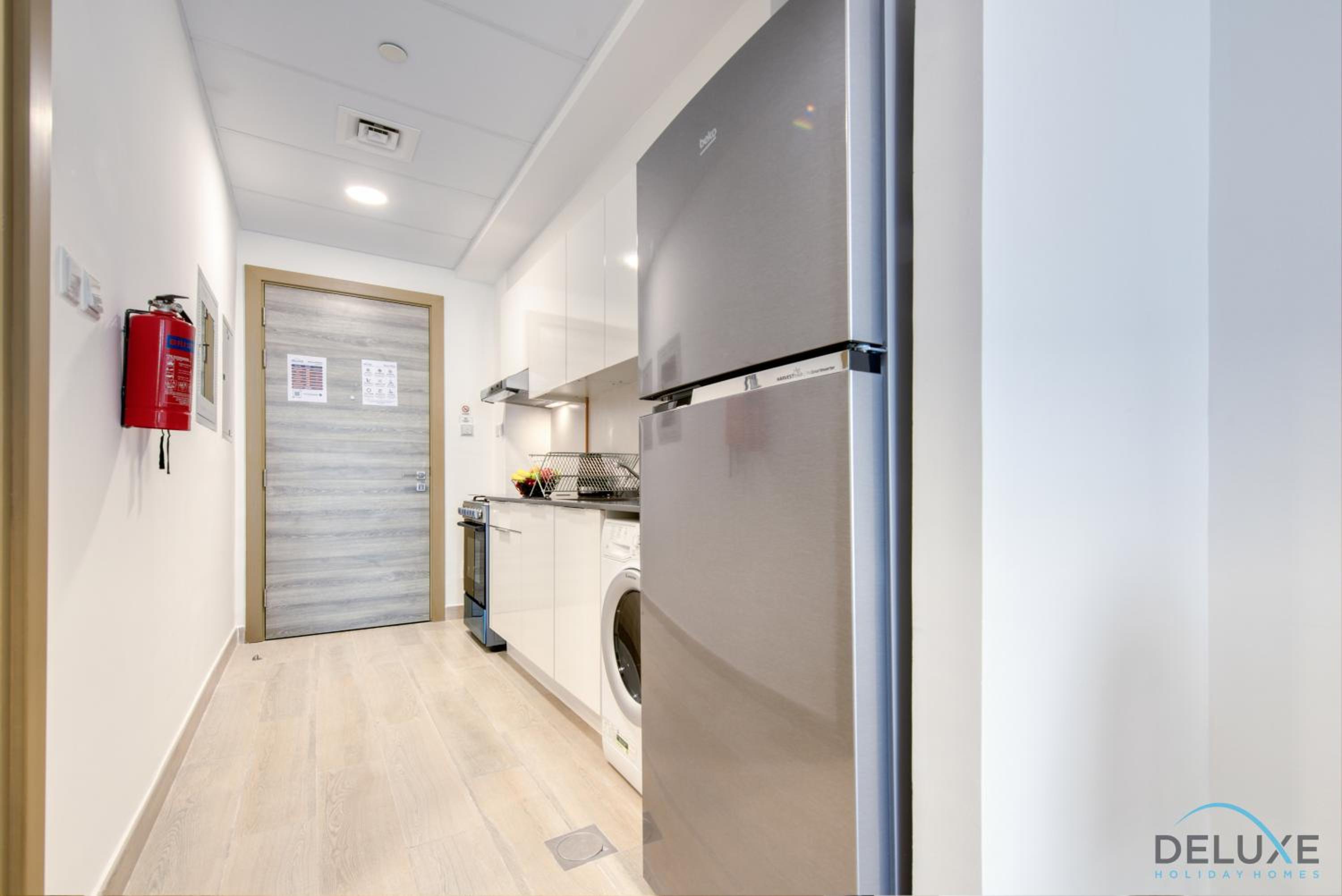Snug Studio at Bloom Towers C JVC by Deluxe Holiday Homes