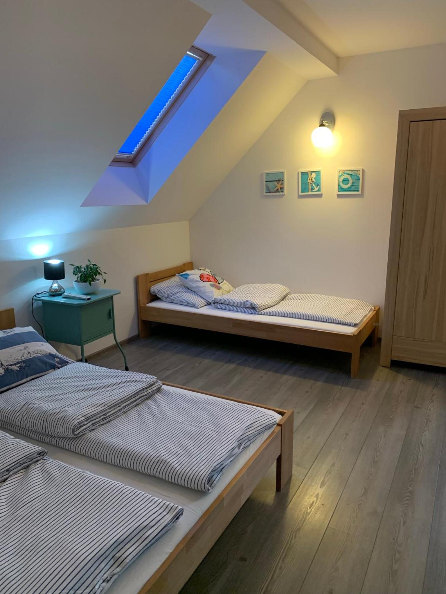 Pokoje ArkaSasino z sauną ogrodową