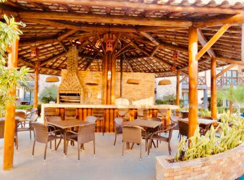 Bangalô com área de lazer estilo resort