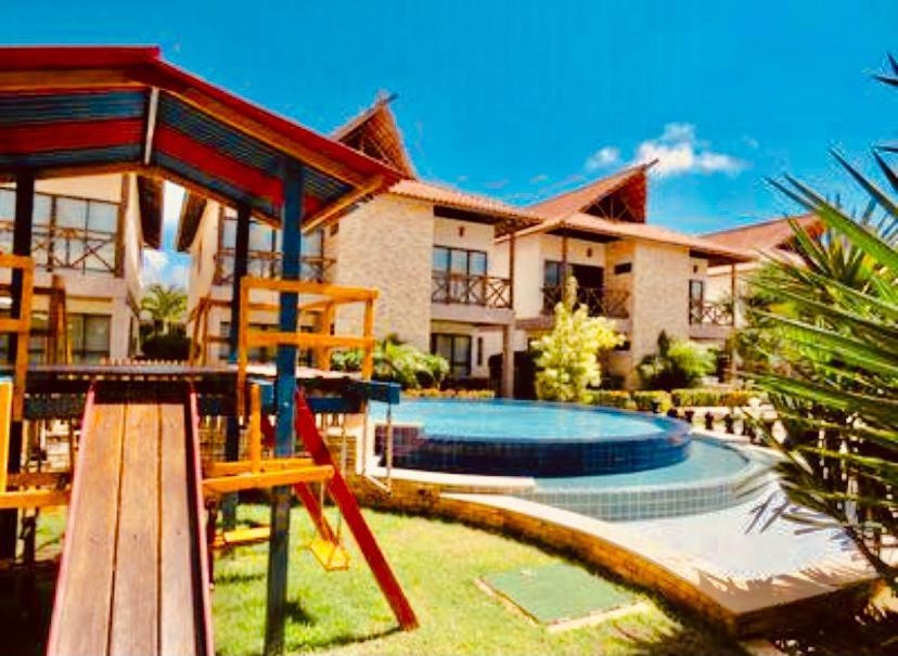 Bangalô com área de lazer estilo resort