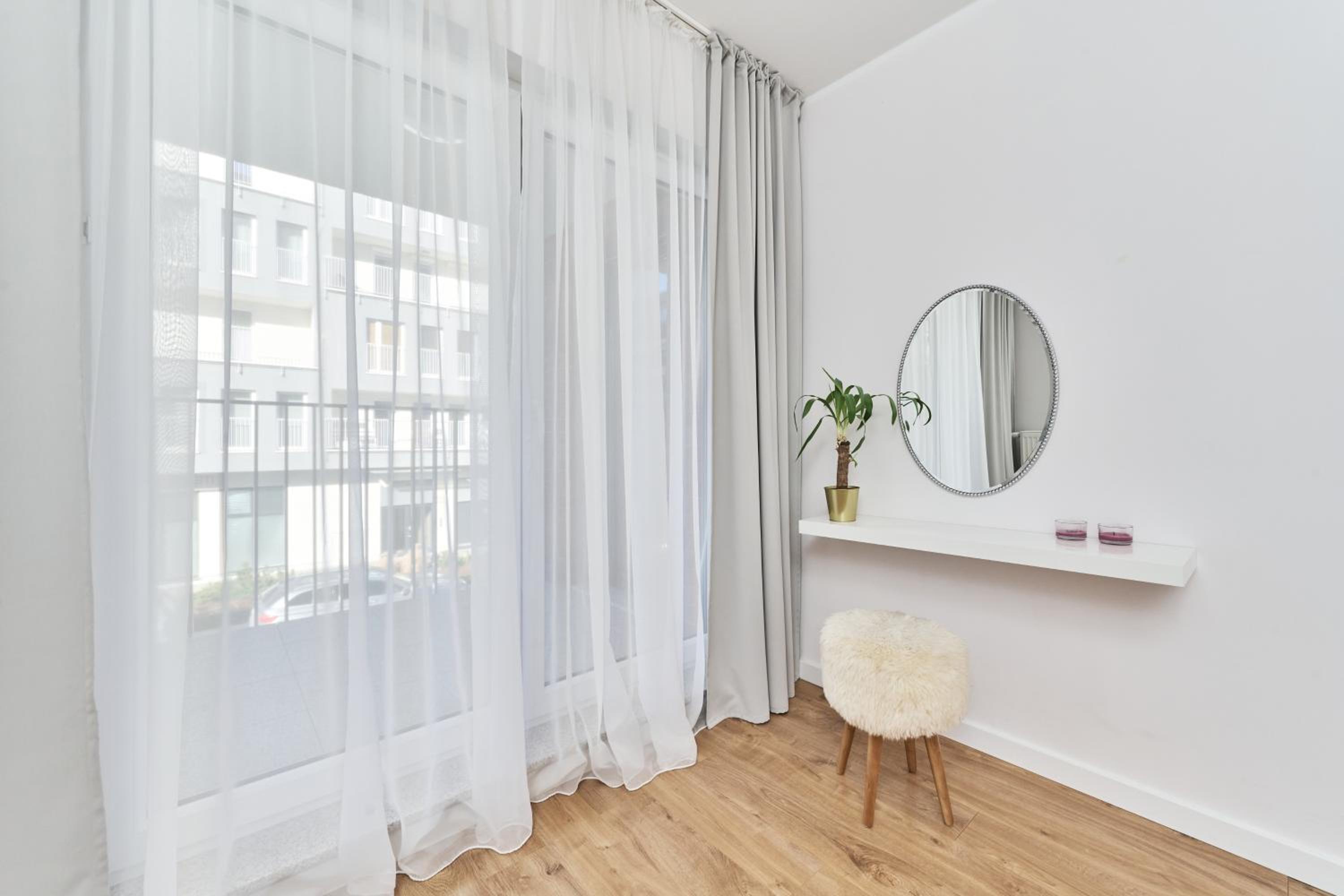 Apartments Dmowskiego Kępa Mieszczańska by Renters
