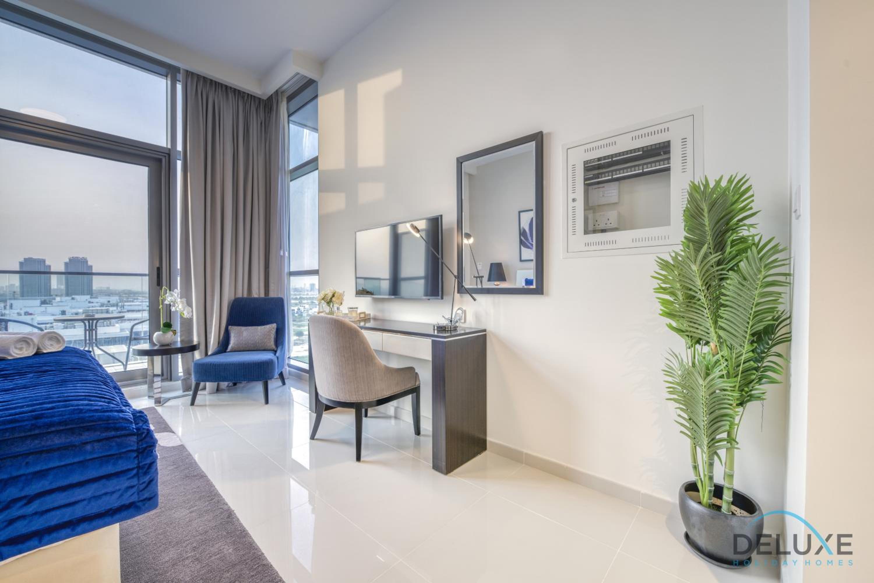Sunlit Studio at Golf Promenade 2A DAMAC Hills By Deluxe Holiday Homes