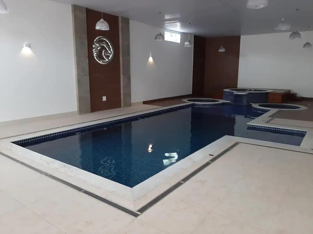 AGRADÁVEL FLAT - CAVALINHO BRANCO - ÁGUAS DE LINDÓIA