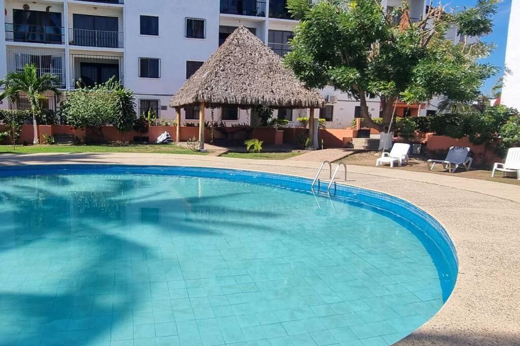 Encantador departamento con alberca en PB a 10min Playa view 5