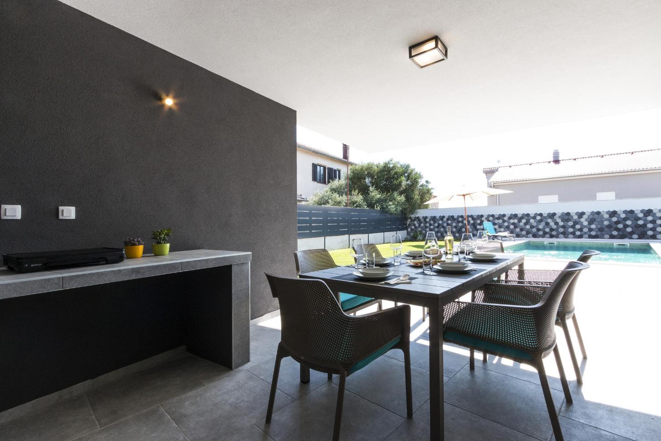 Modern 3-bedroom villa with a private pool view 4
