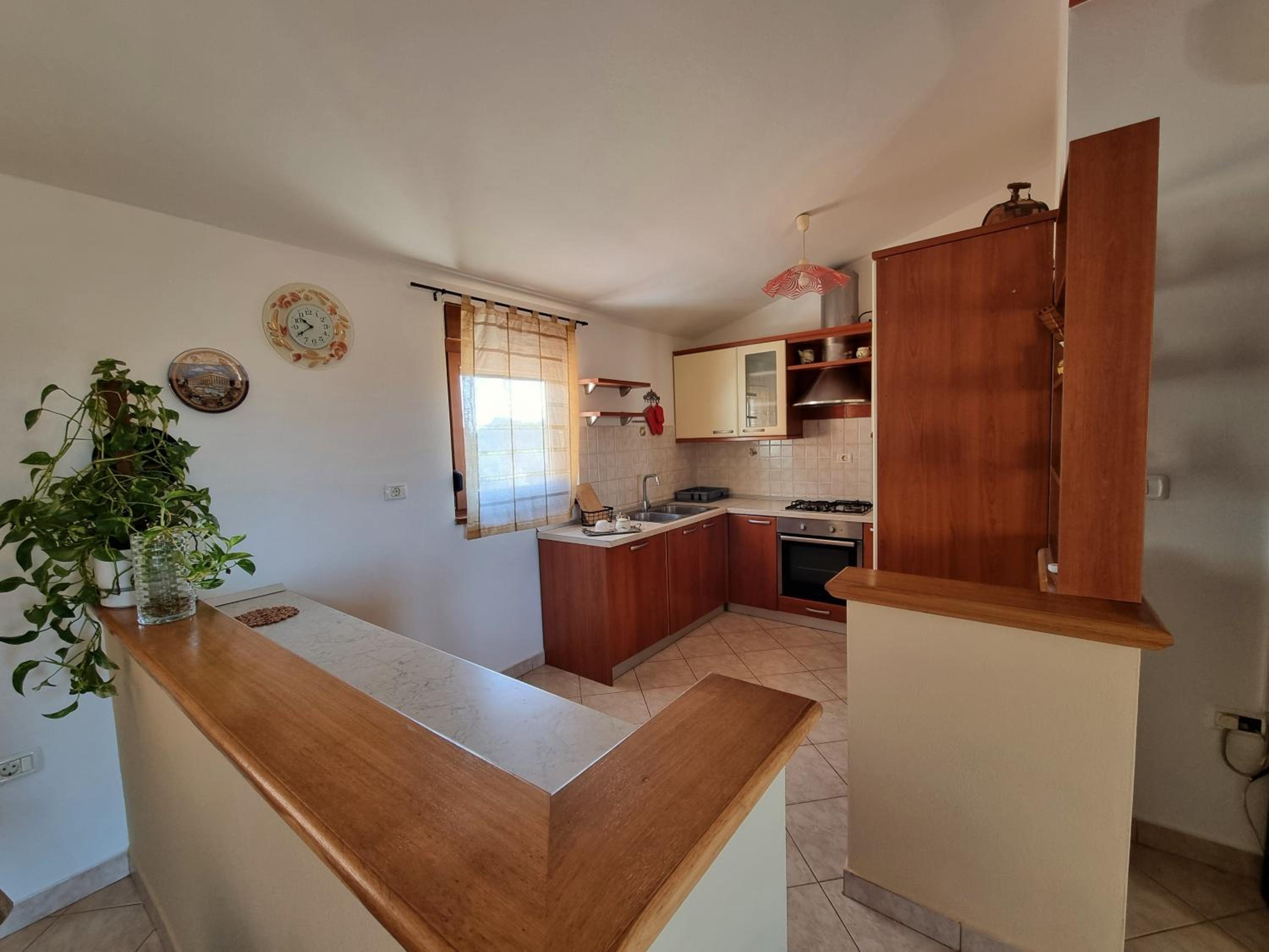 Sunny apartment with pool view 2