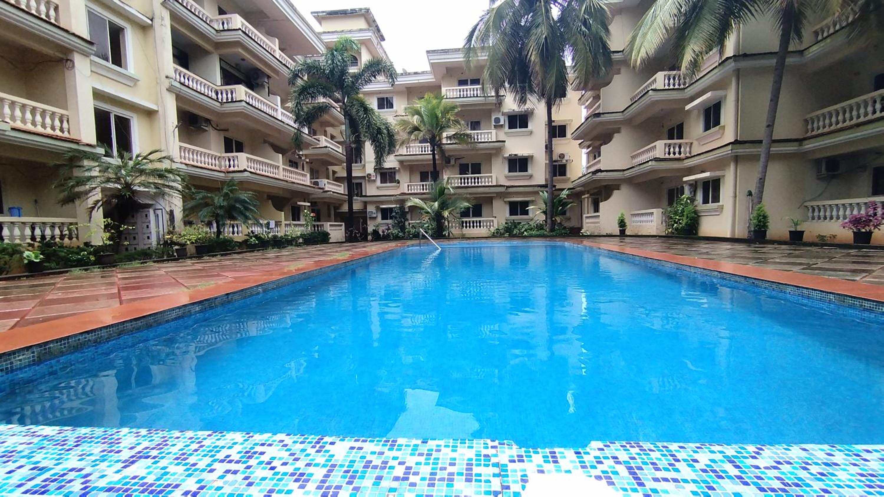 Seacoast Retreat- Lovely 2 BHK apartment with pool