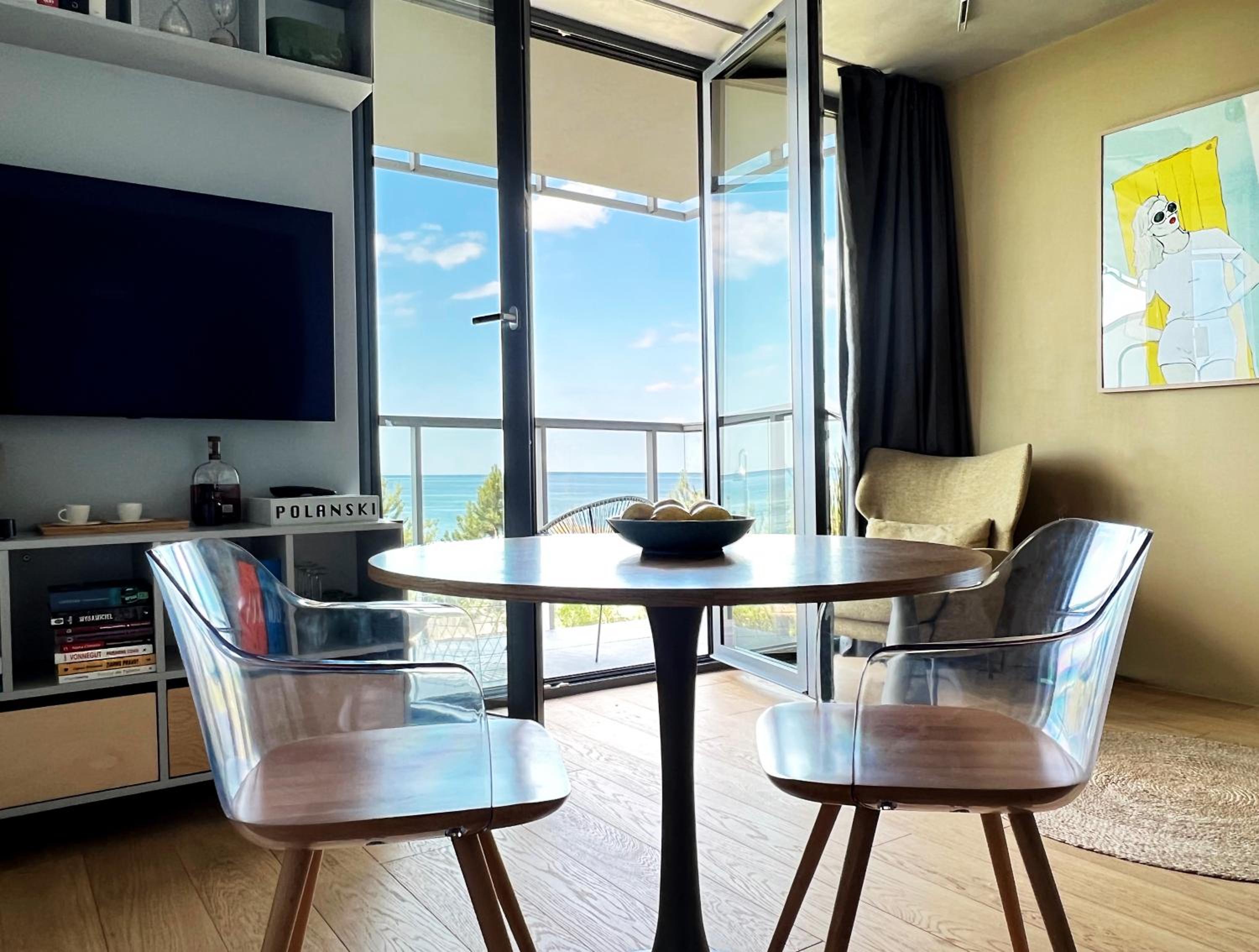 Tuż przy plaży - nowoczesny apartament z tarasem i pięknym widokiem na Bałtyk