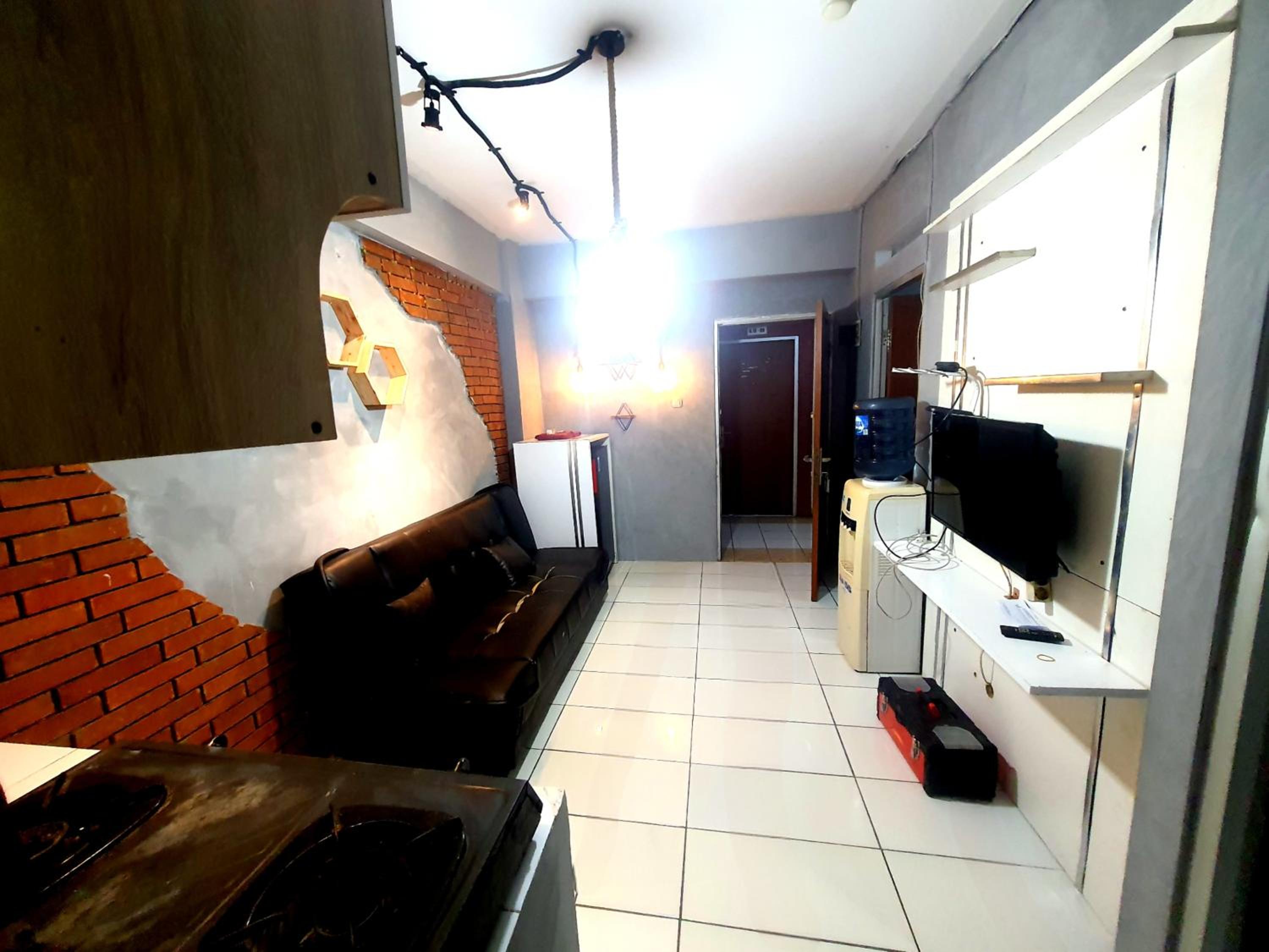 Cibubur Village Apartment by Sang Living view 5