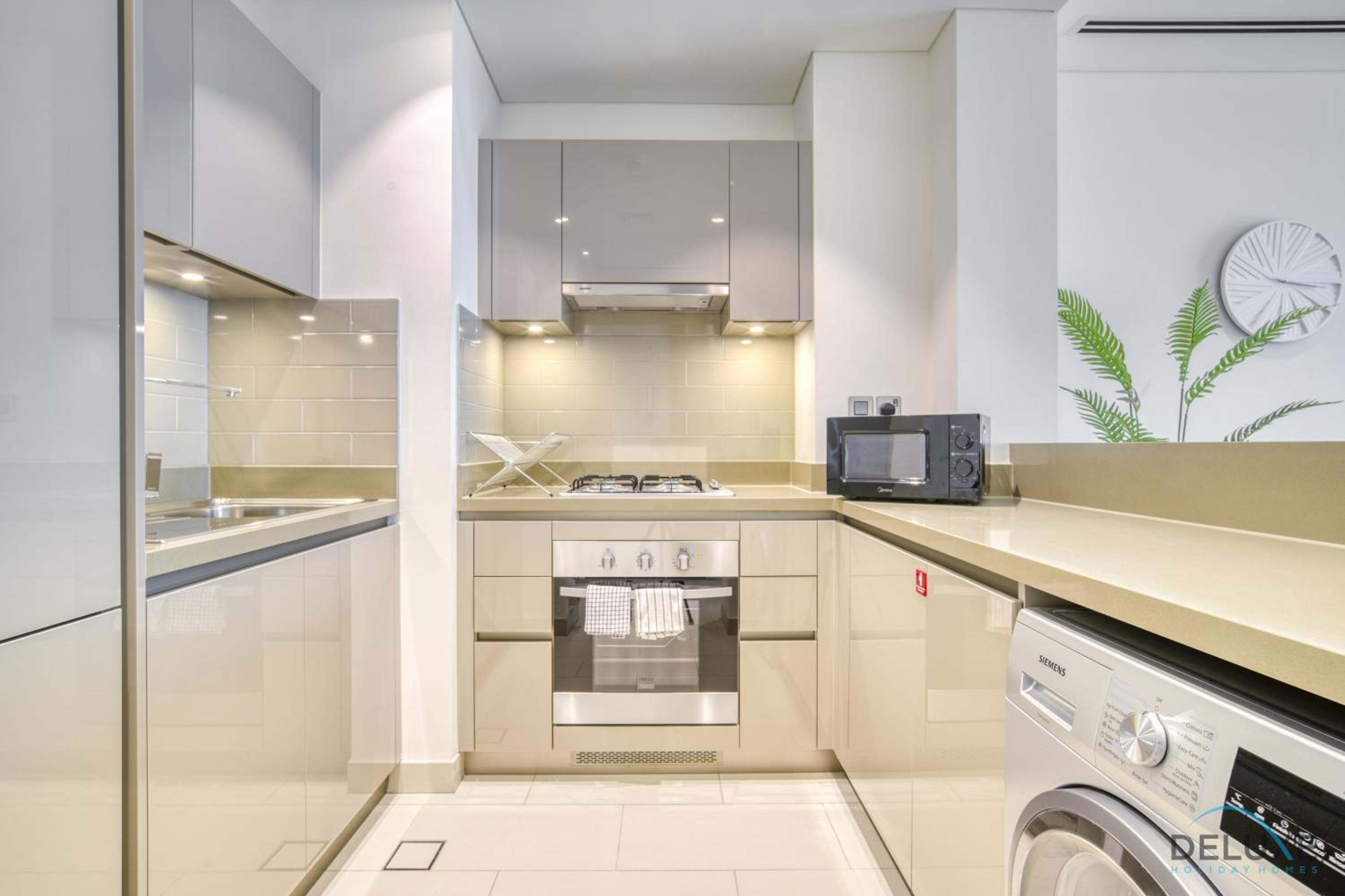 Dynamic 1BR at Sobha Hartland Greens MBR City by Deluxe Holiday Homes photo 5