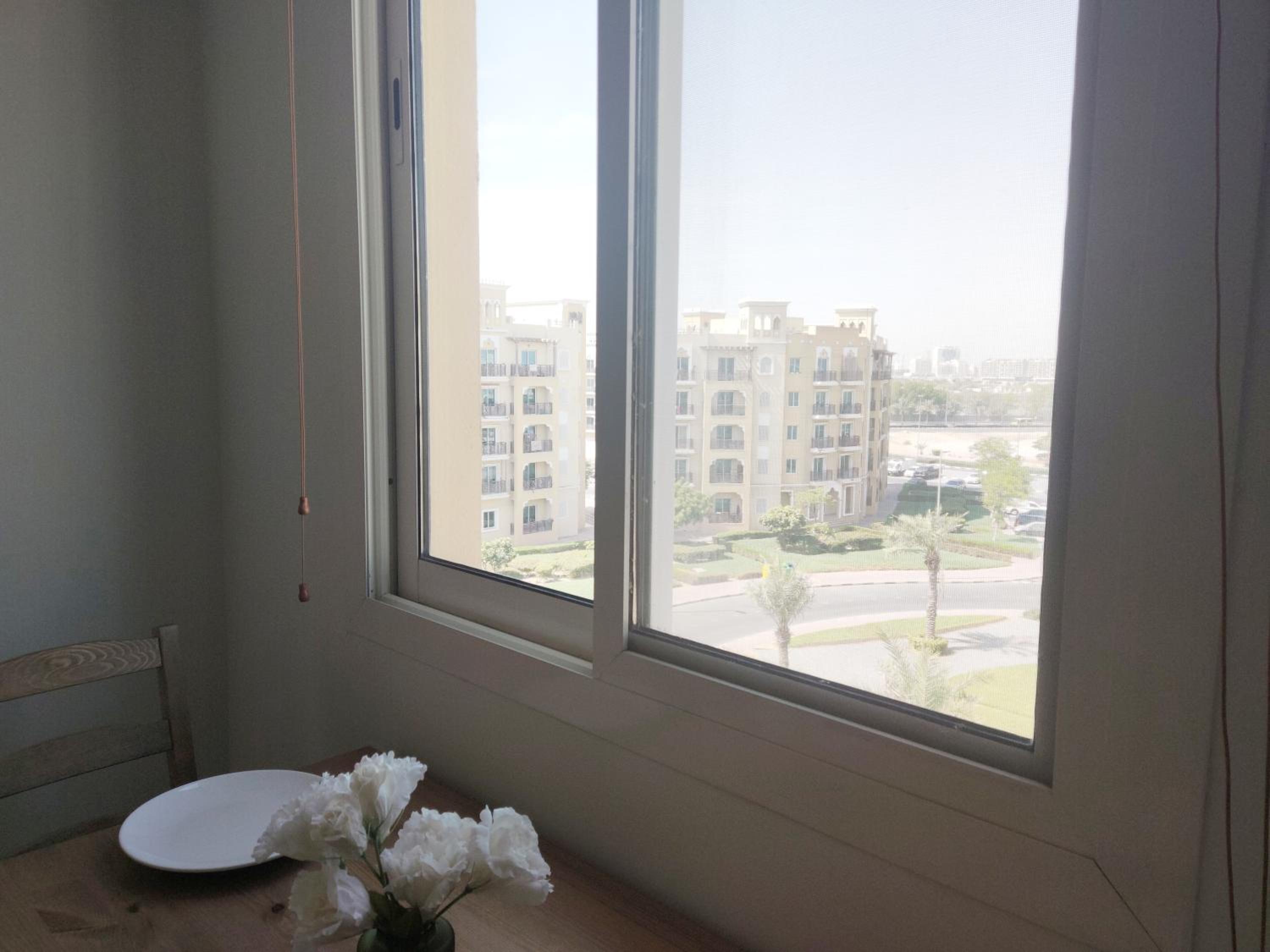 Cozy 1BR Apartment close to Dragon Market and Global Village