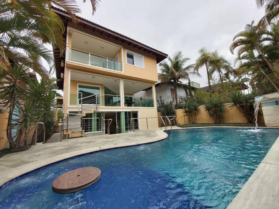 CASA COND HANGA ROA BERTIOGA 4 Func