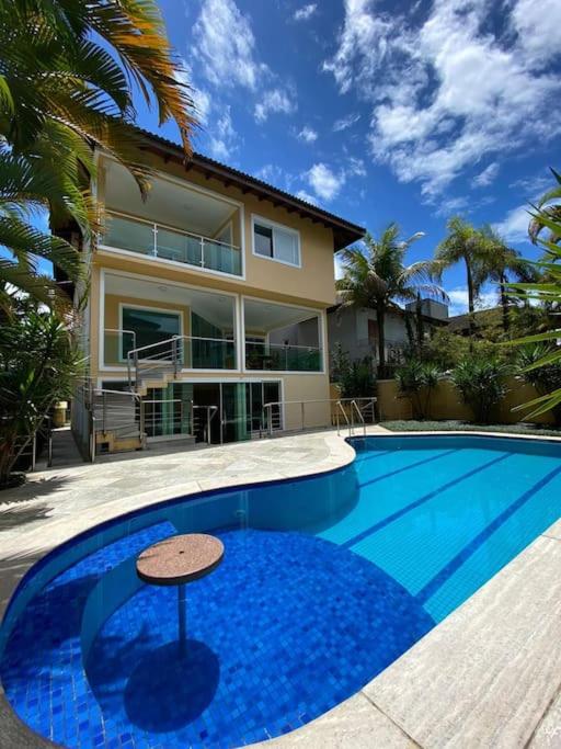 CASA COND HANGA ROA BERTIOGA 4 Func