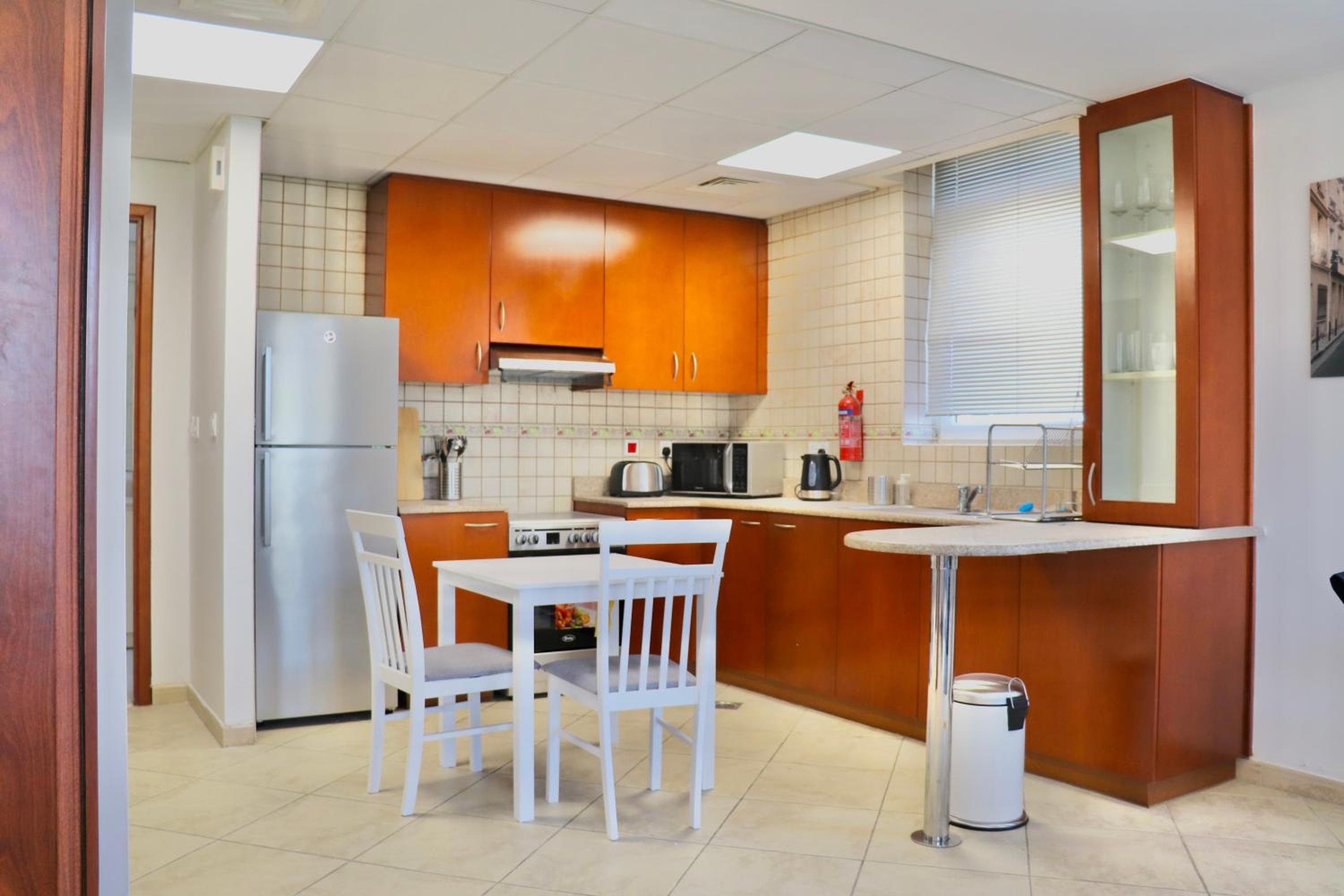 Unified Vacation Homes-Spacious Studio in lush green Motor City