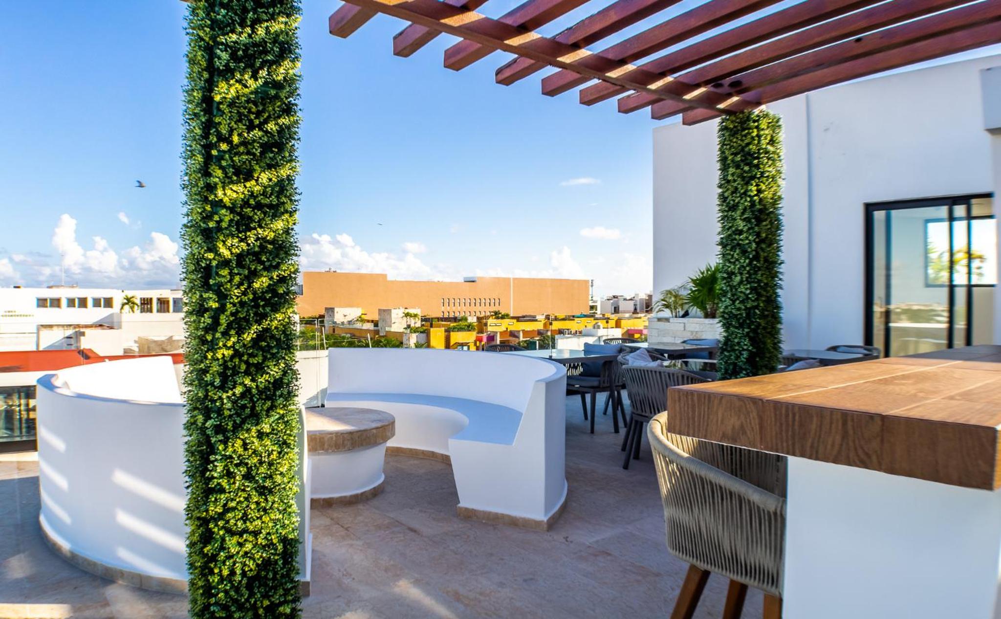 Estudio106 centrico en Menesse38 con roof