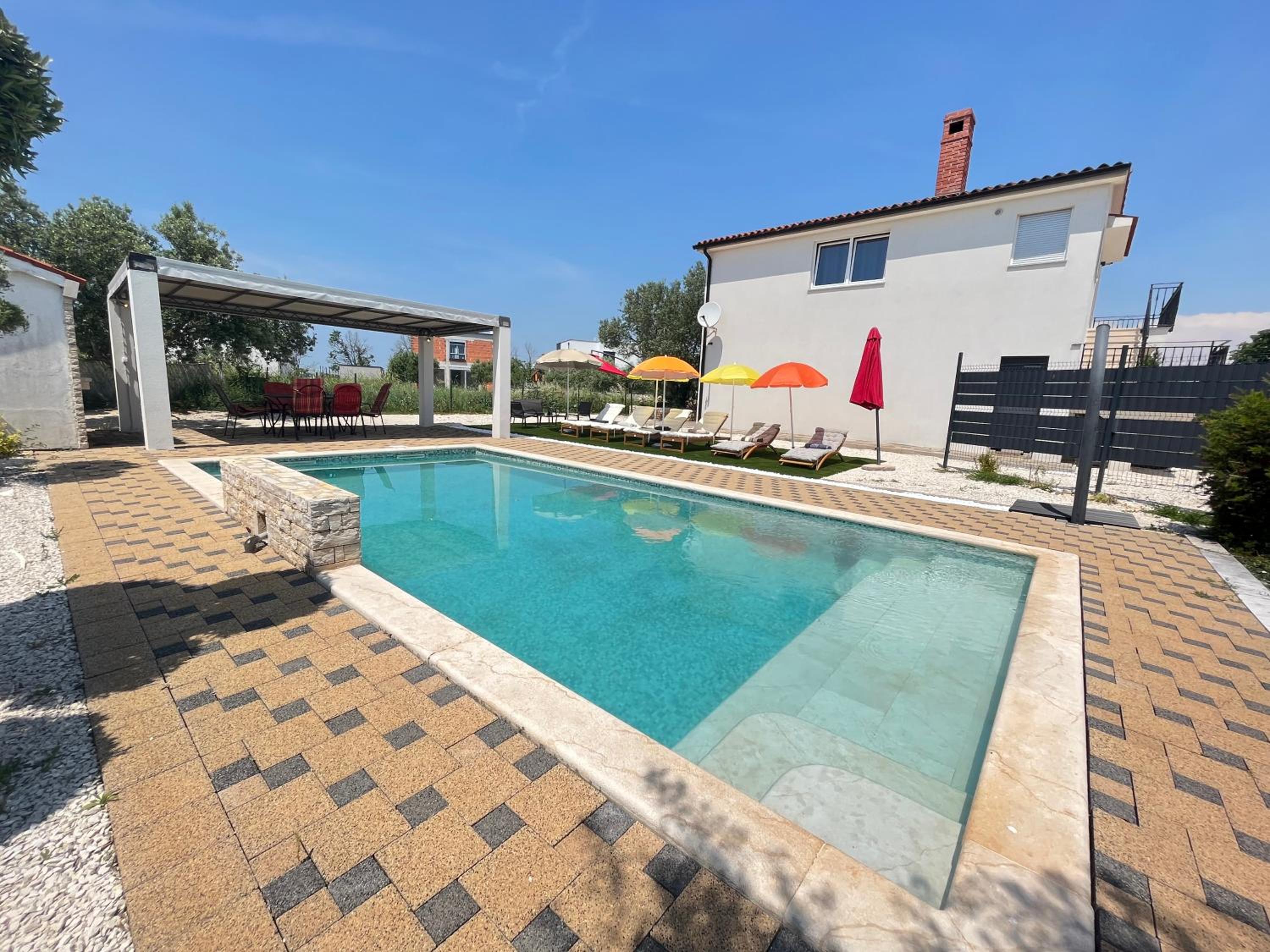 Holiday house with a private heated swimming pool view 2