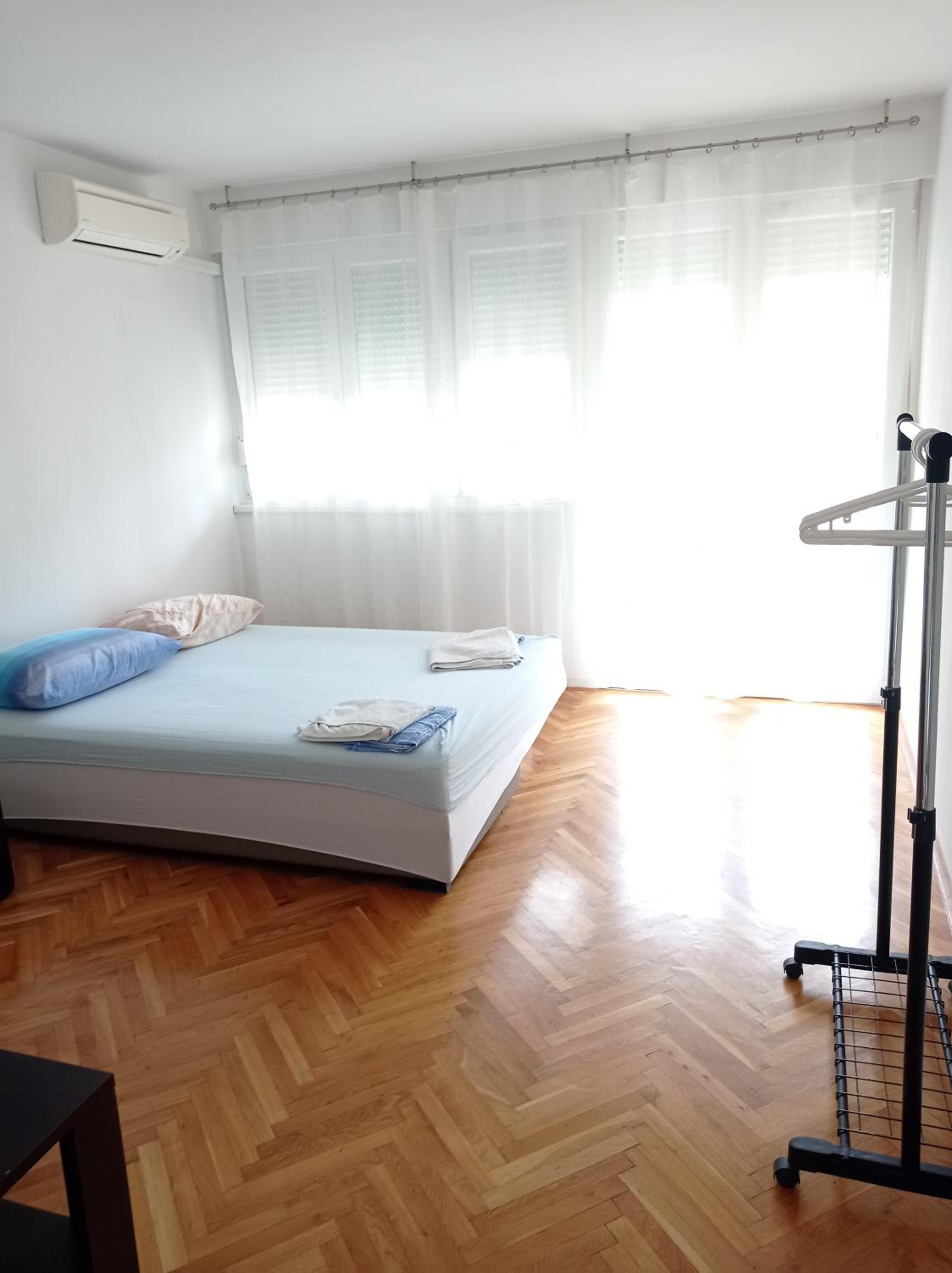 Nice and cozy two single bed room view 3
