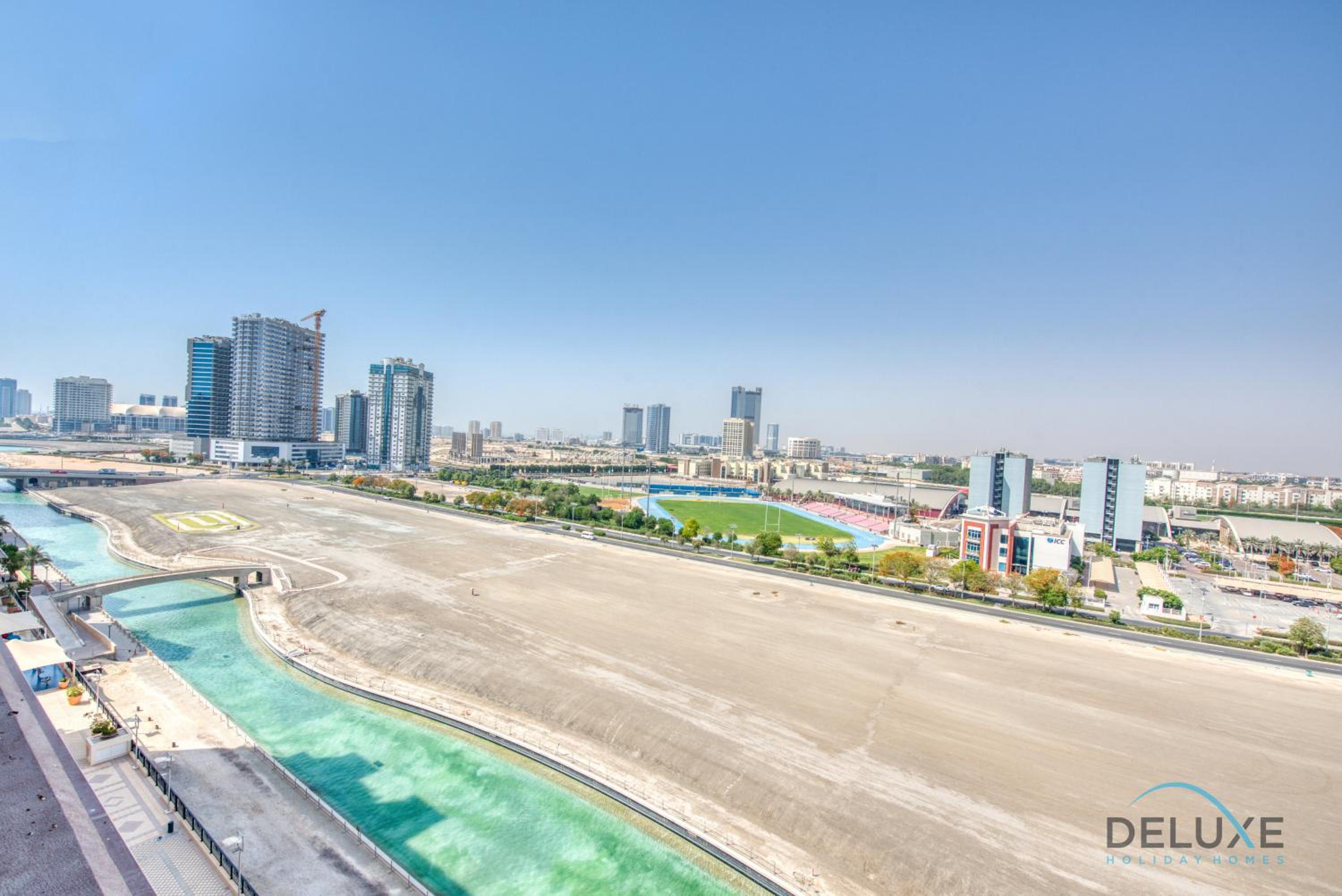 Vivid 2BR at Canal Residences West Dubai Sports City by Deluxe Holiday Homes