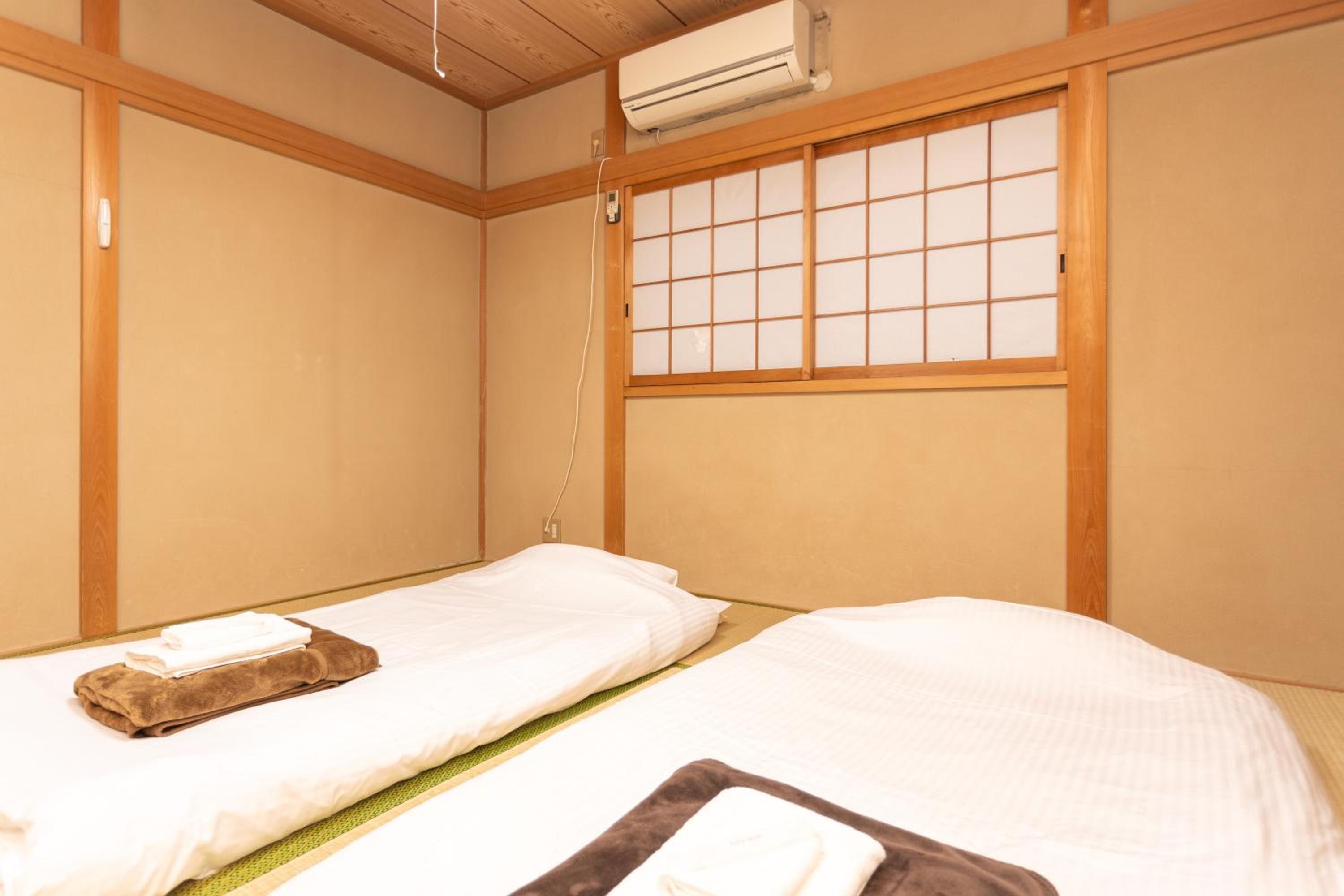 Guest House OneWorld Toji