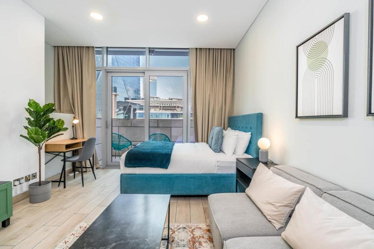 Silkhaus newly furnished studio facing DIFC with pool and gym access